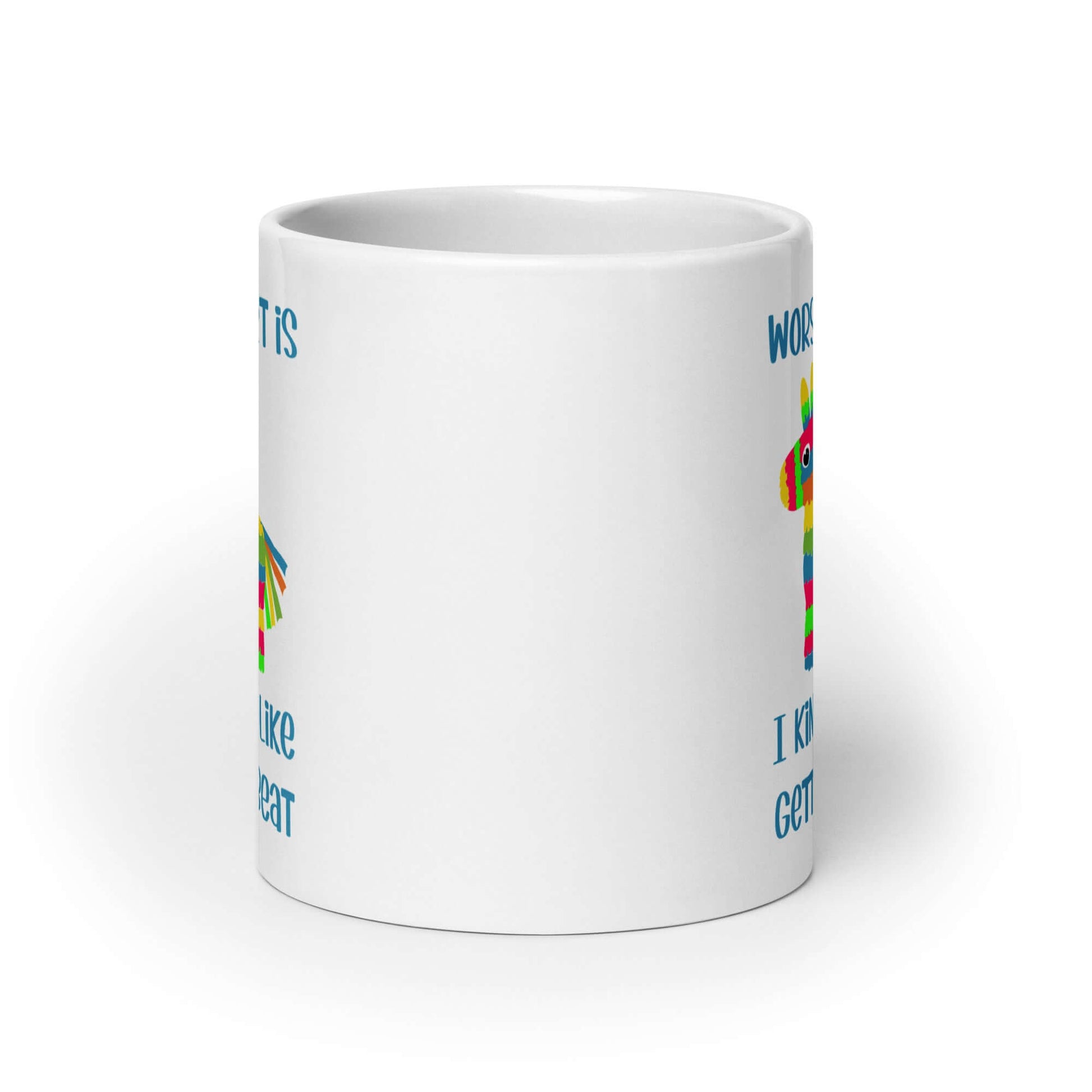 White ceramic coffee mug with an image of a colorful donkey pinata & the words Worst part is I kind of like getting beat printed on both sides.