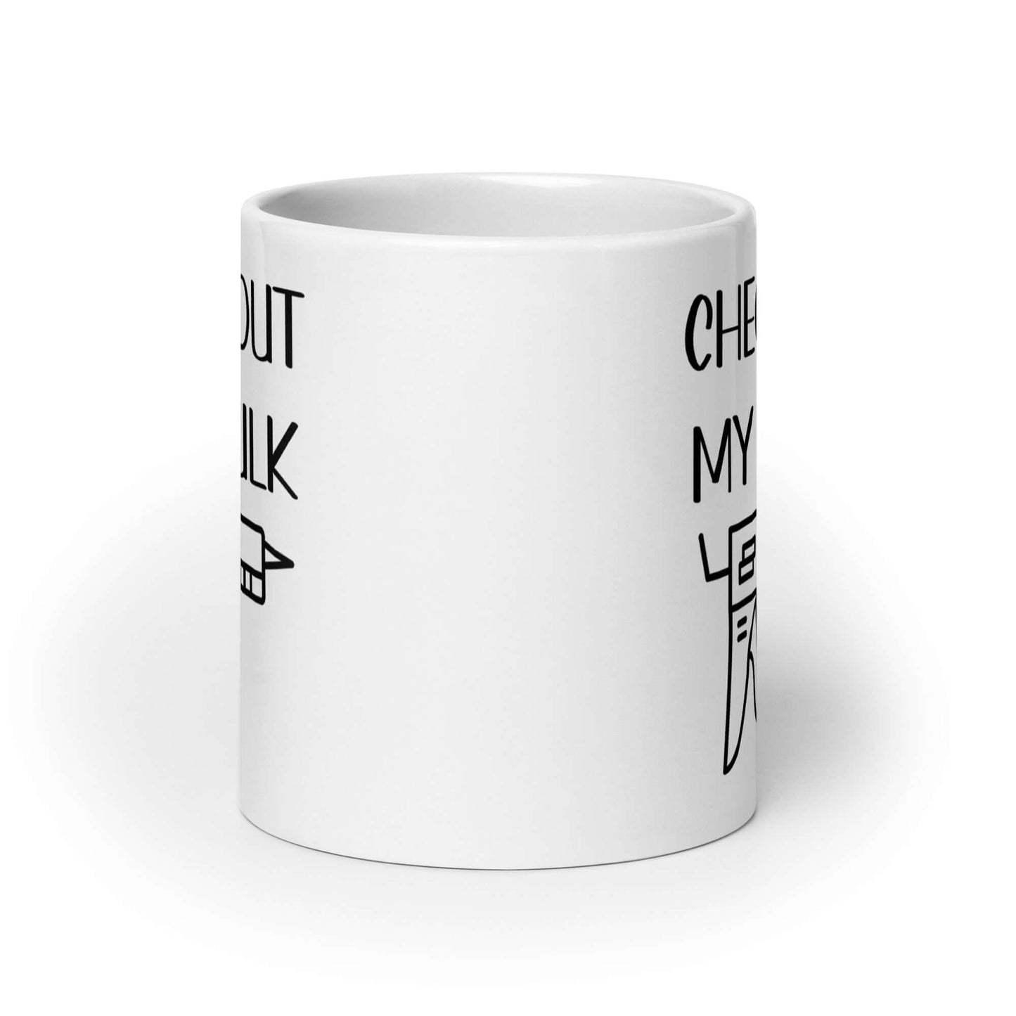 White ceramic coffee mug with the pun phrase Check out my caulk with a line drawing image of a caulking gun printed on both sides.