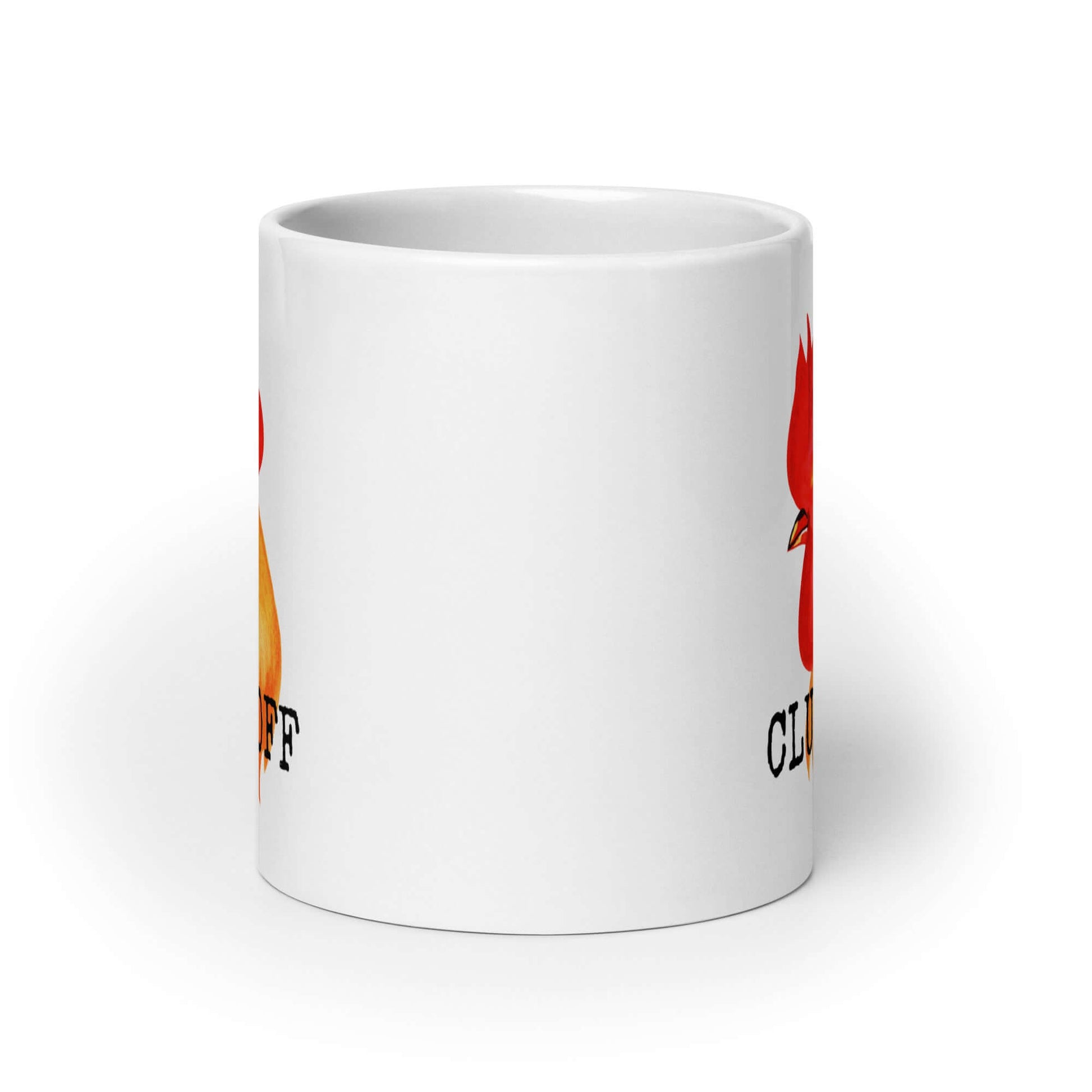 White ceramic mug pun that has graphic of a chicken and the words Cluck off printed on both sides.