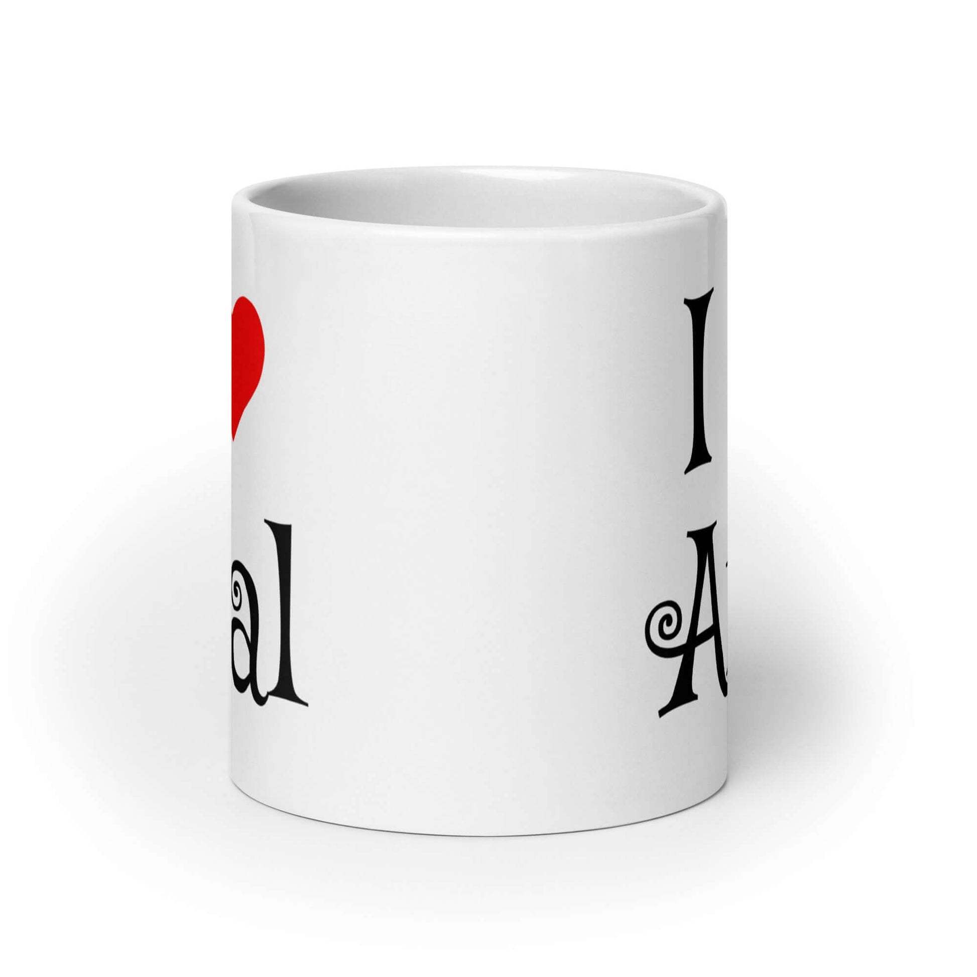 White ceramic coffee mug with the words I heart anal printed on both sides. The heart is red.