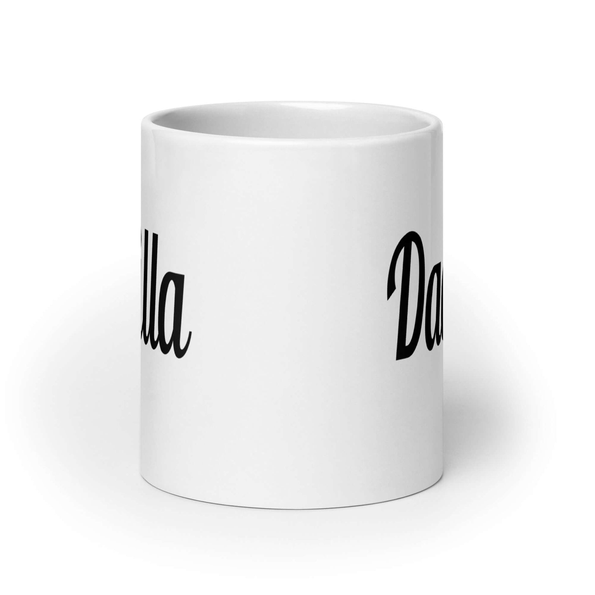 White ceramic coffee mug with the word Dadzilla printed on both sides of the mug.