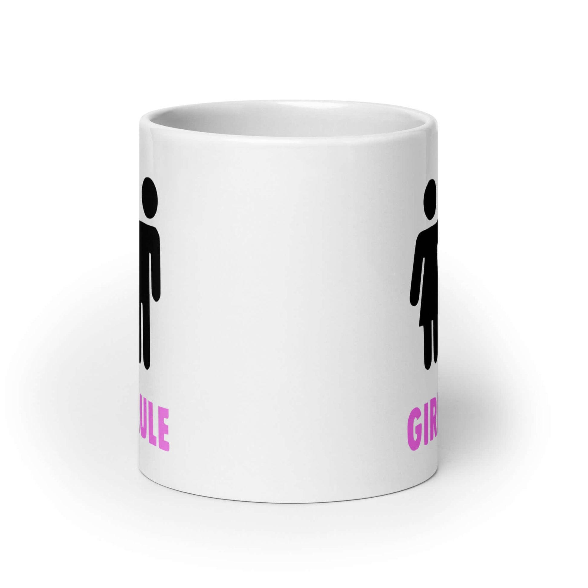 White ceramic mug with an image of a stick figure man and woman. The stick woman is punching the stick mans head off and the words Girls rule is printed beneath in hot pink. The graphics are printed on the front of the shirt..