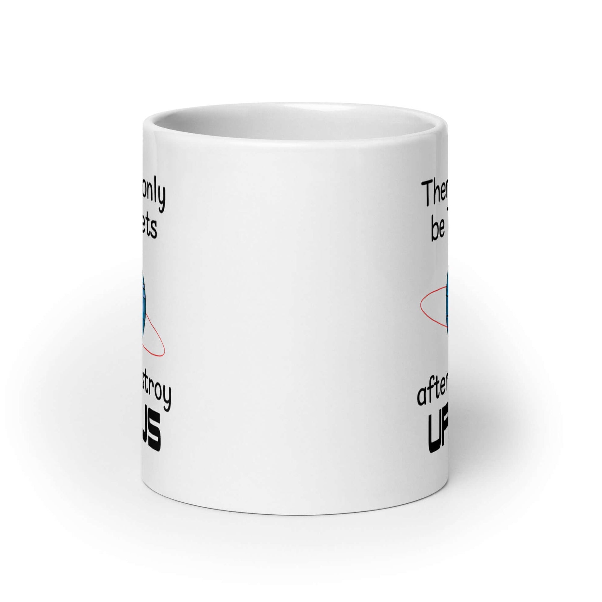 White ceramic coffee mug with an image of a planet and the phrase There will only be 7 planets after I destroy Uranus printed on both sides of the mug.