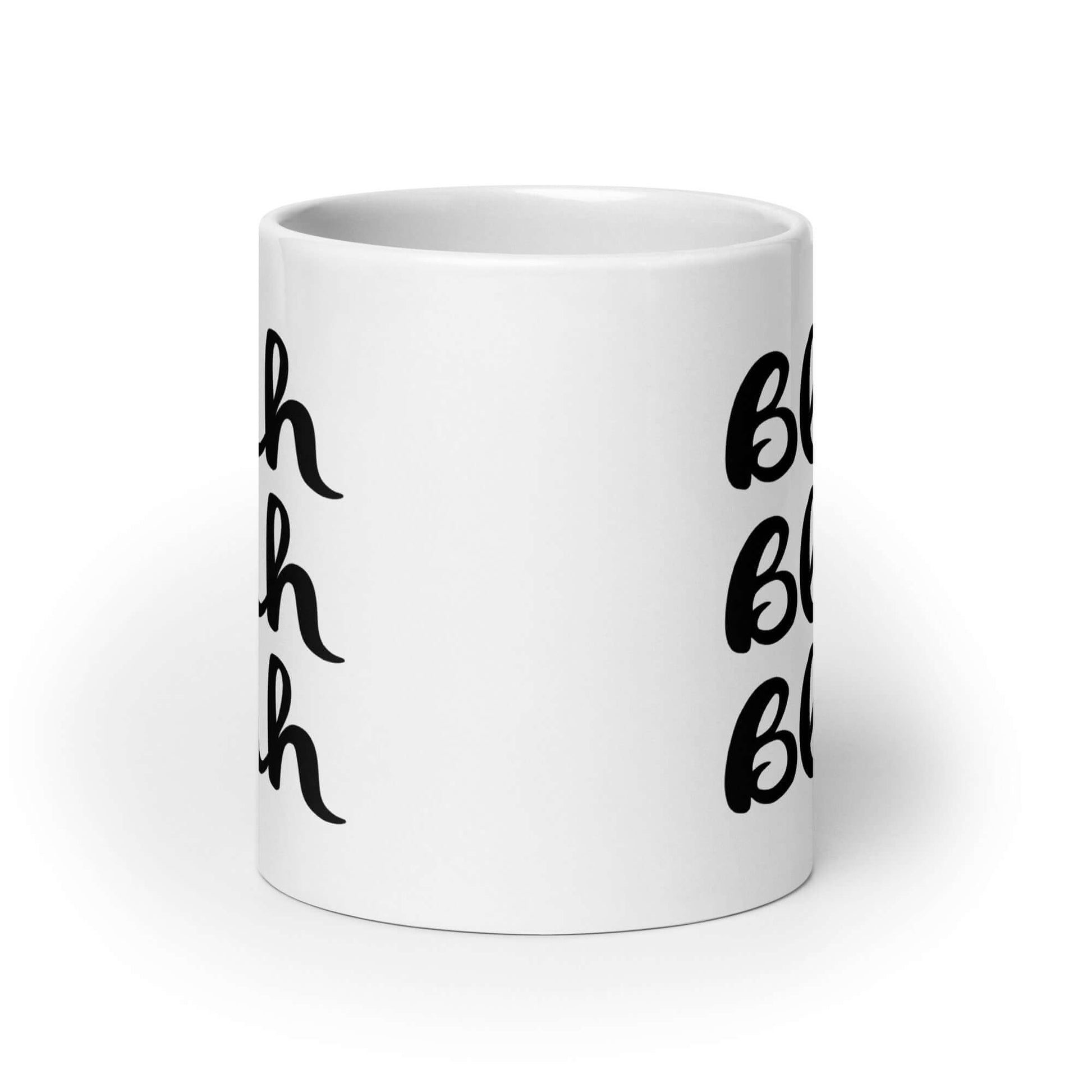 White ceramic coffee mug with the words Blah Blah Blah printed on both sides.