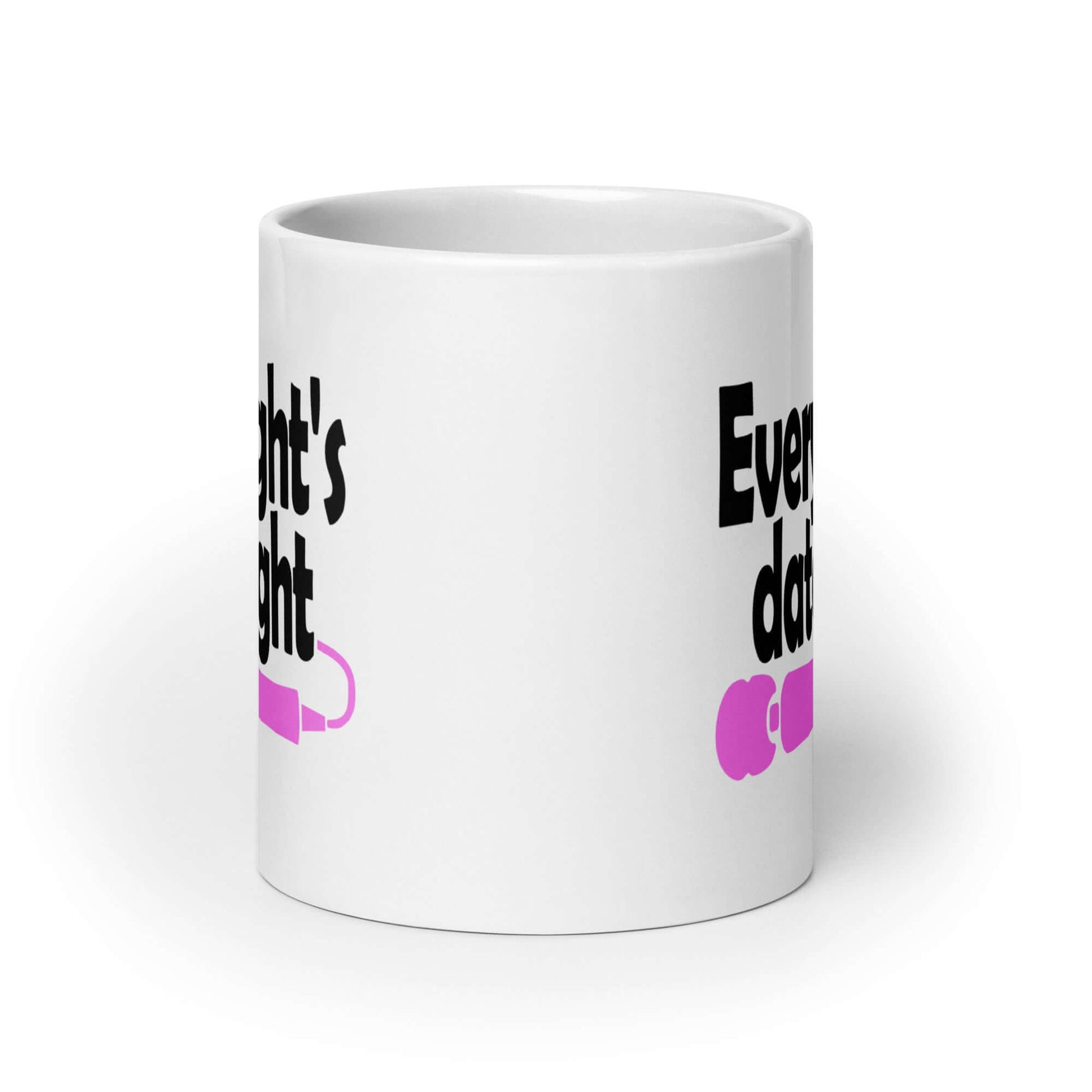 White ceramic coffee mug with the phrase Every night is date night with a hot pink wand vibrator printed beneath. The graphics are printed on both sides of the mug.