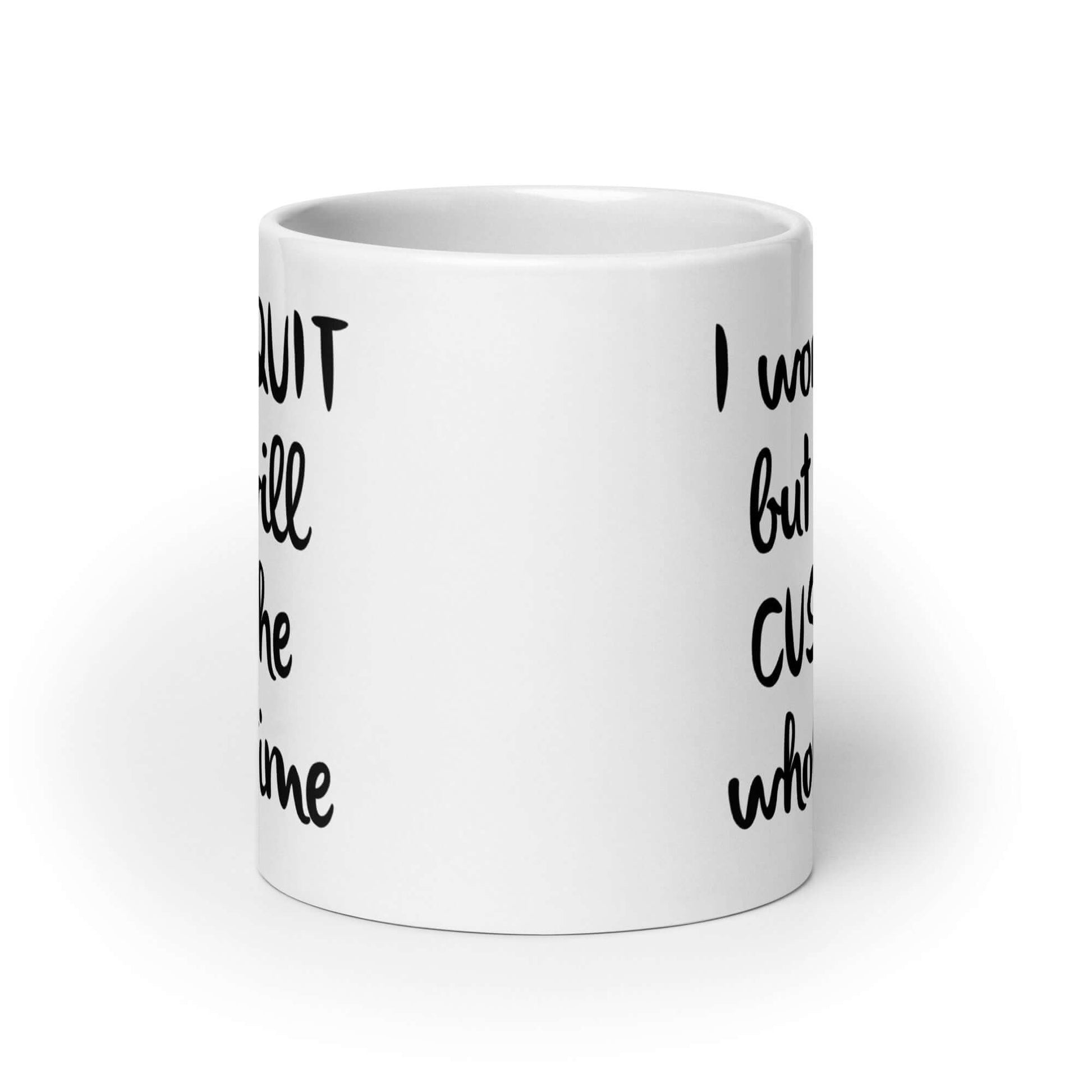 White ceramic mug with the phrase I won't quit but I will cuss the whole time printed on both sides of the mug.