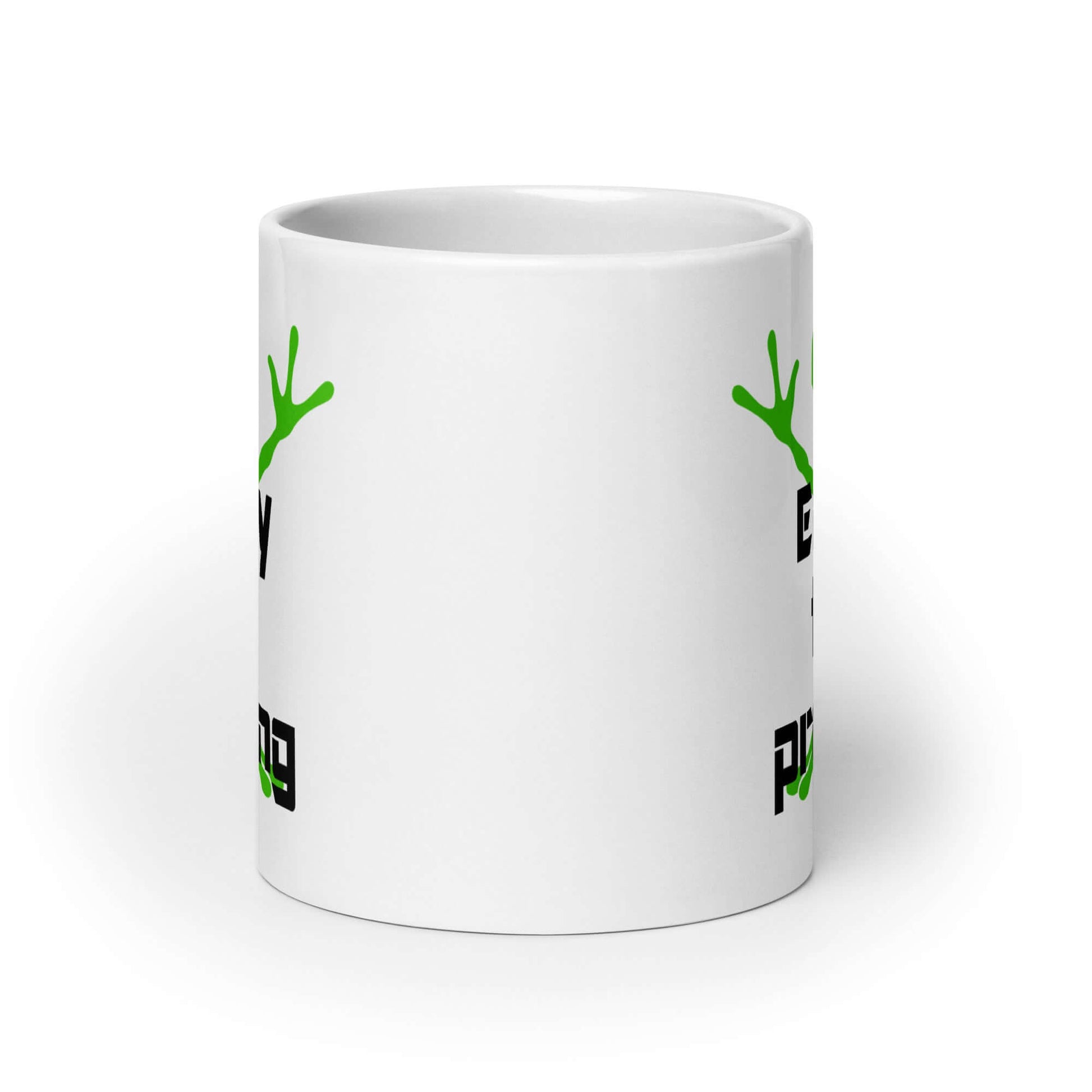 White ceramic coffee mug with an image of an alien and the funny phrase Enjoy the probing printed on both sides of the mug.