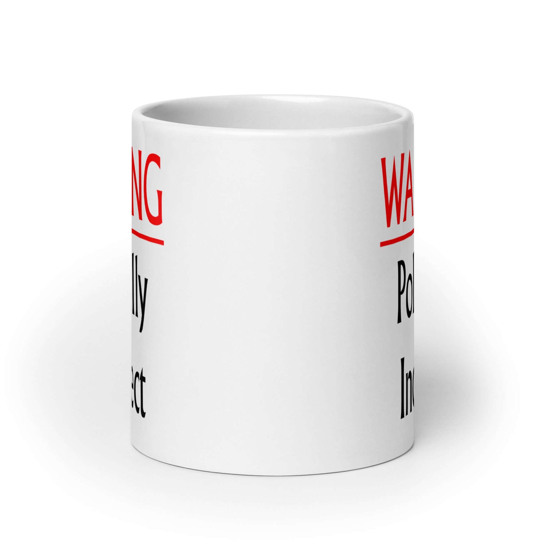 White ceramic coffee mug with the phrase Warning politically incorrect printed on both sides of the mug.