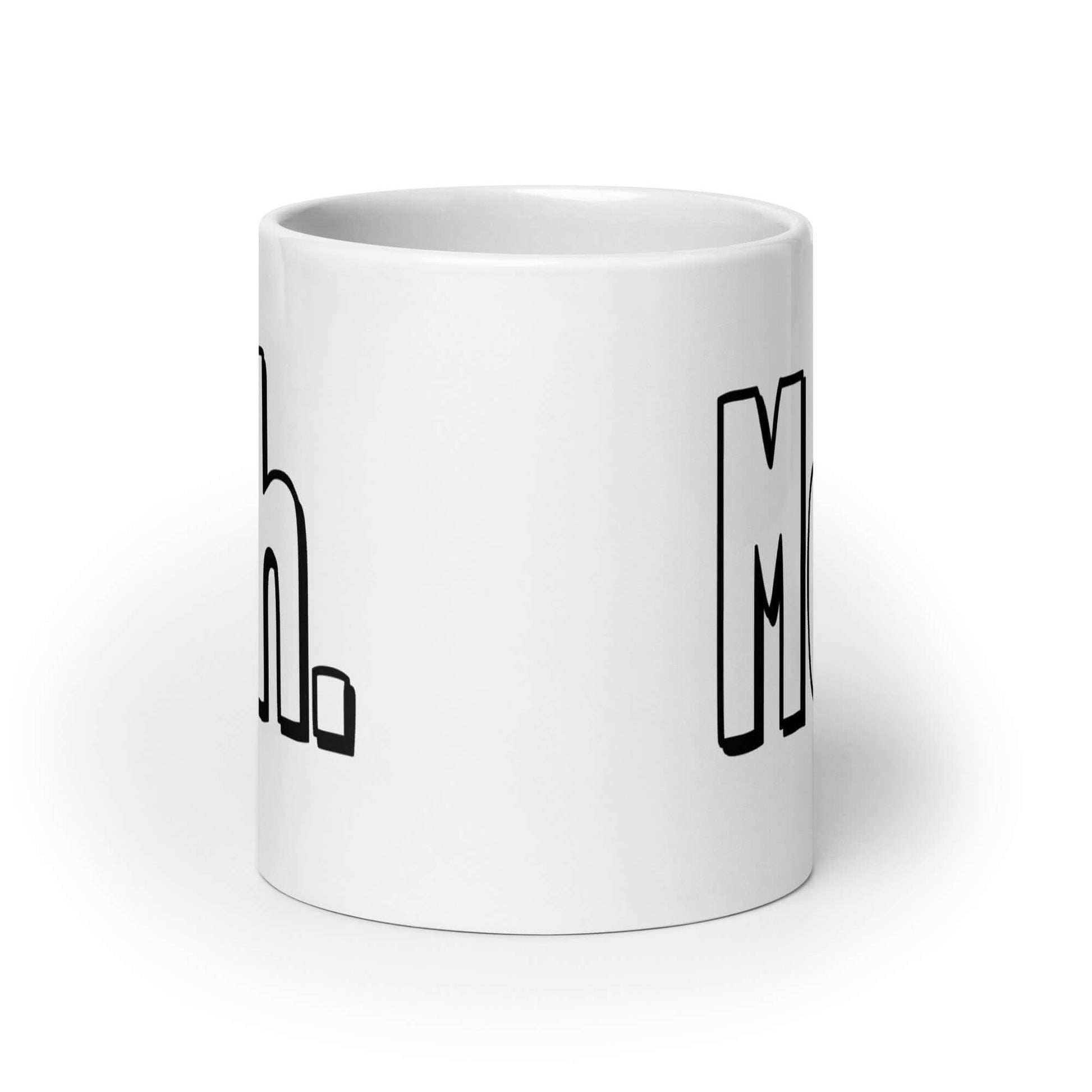 White ceramic coffee mug with the word Meh printed on both sides.