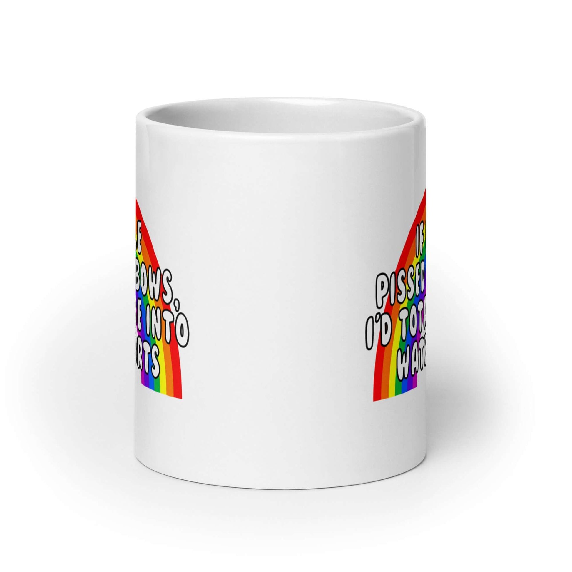 White ceramic coffee mug with an image of a rainbow and the phrase If people pissed rainbows I'd totally be into watersports printed on both sides of the mug
