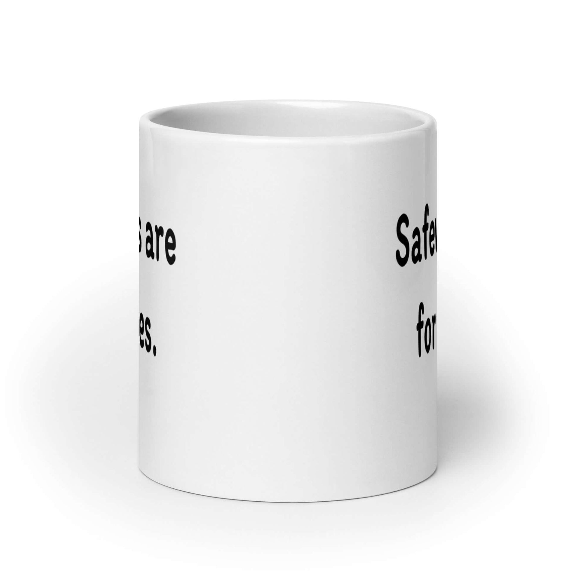 White coffee mug with the phrase Safewords are for sissies printed on both sides of the mug.