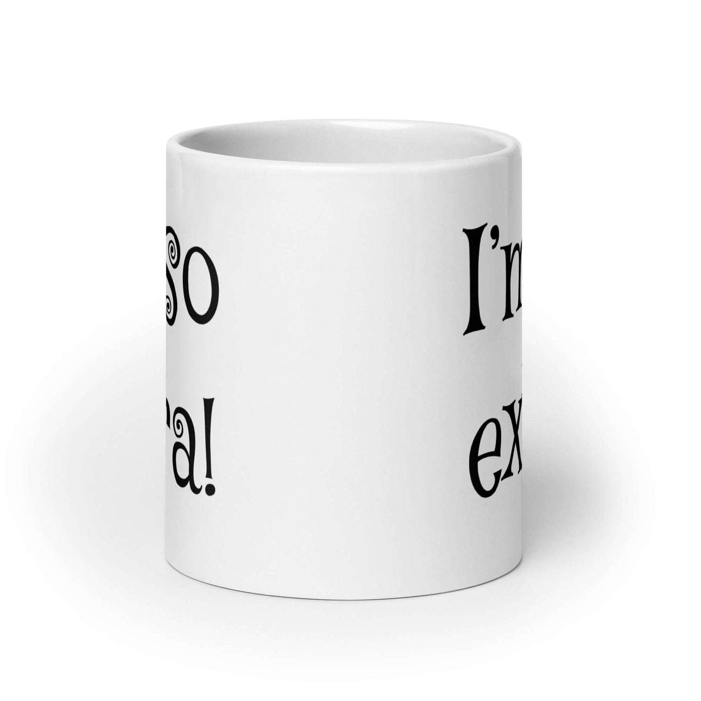 White ceramic mug with the words I'm so extra printed on both sides.