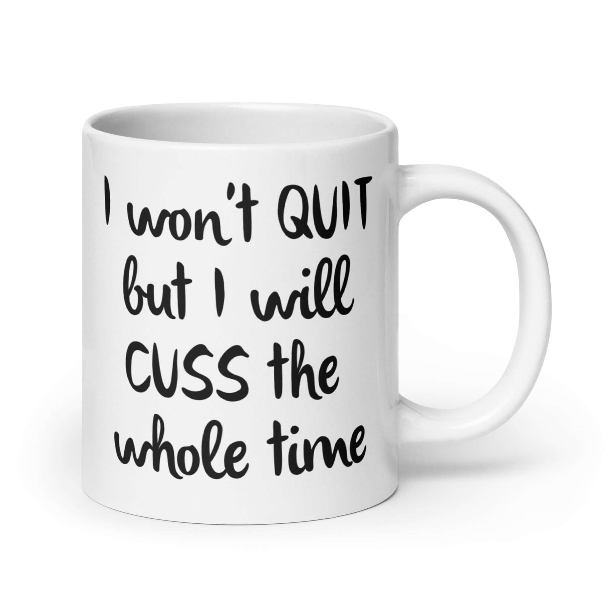 White ceramic mug with the phrase I won't quit but I will cuss the whole time printed on both sides of the mug.