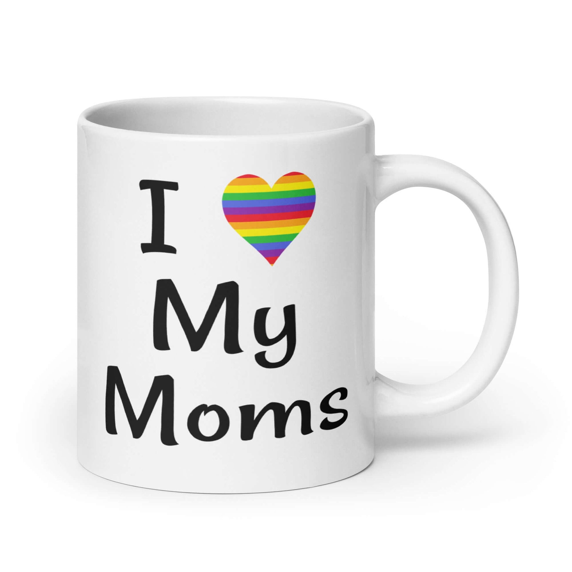 White ceramic coffee mug with the phrase I heart my Moms printed on both sides of the mug. The heart is rainbow.