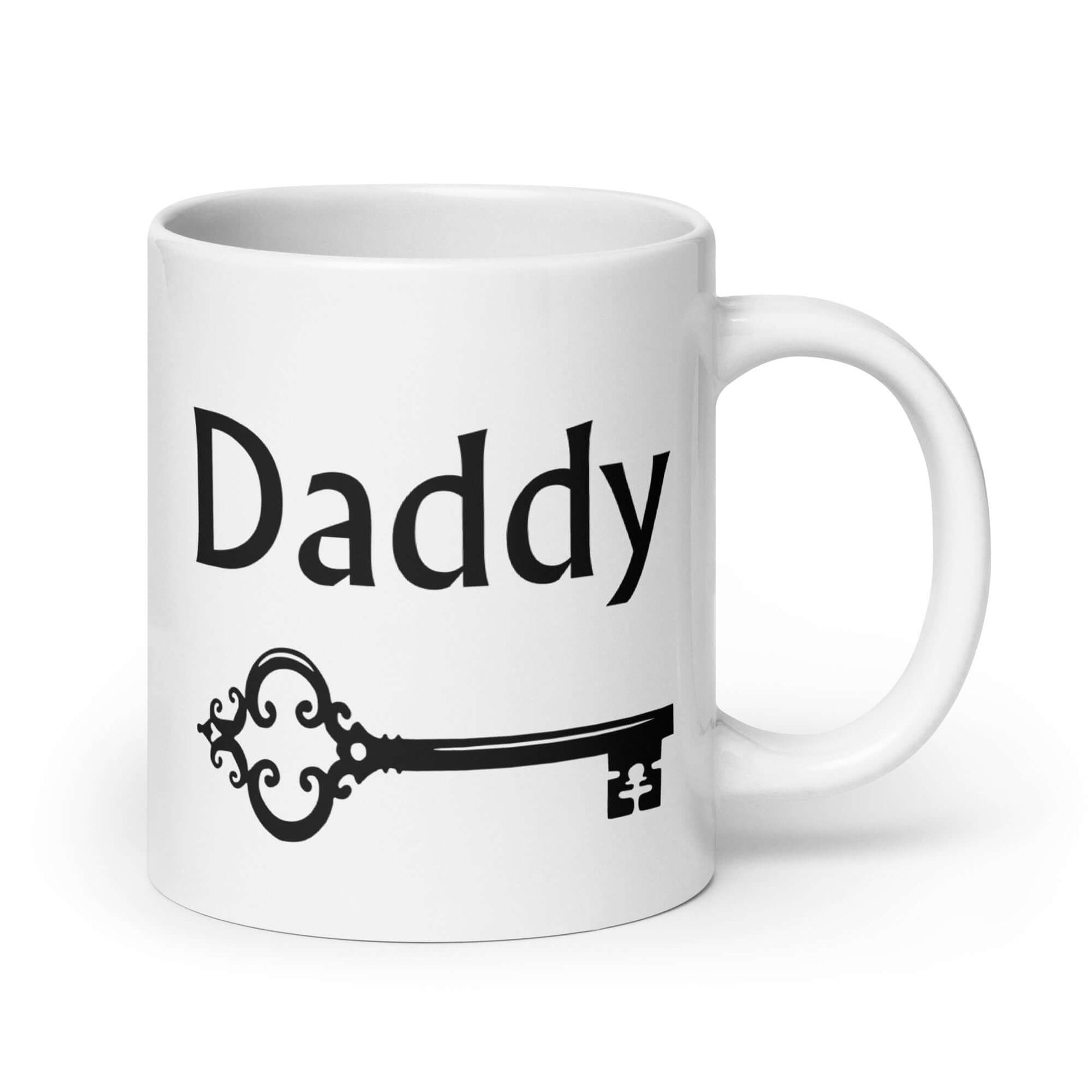 White ceramic coffee mug with an image of a BDSM key and the word Daddy printed on both sides of the mug.