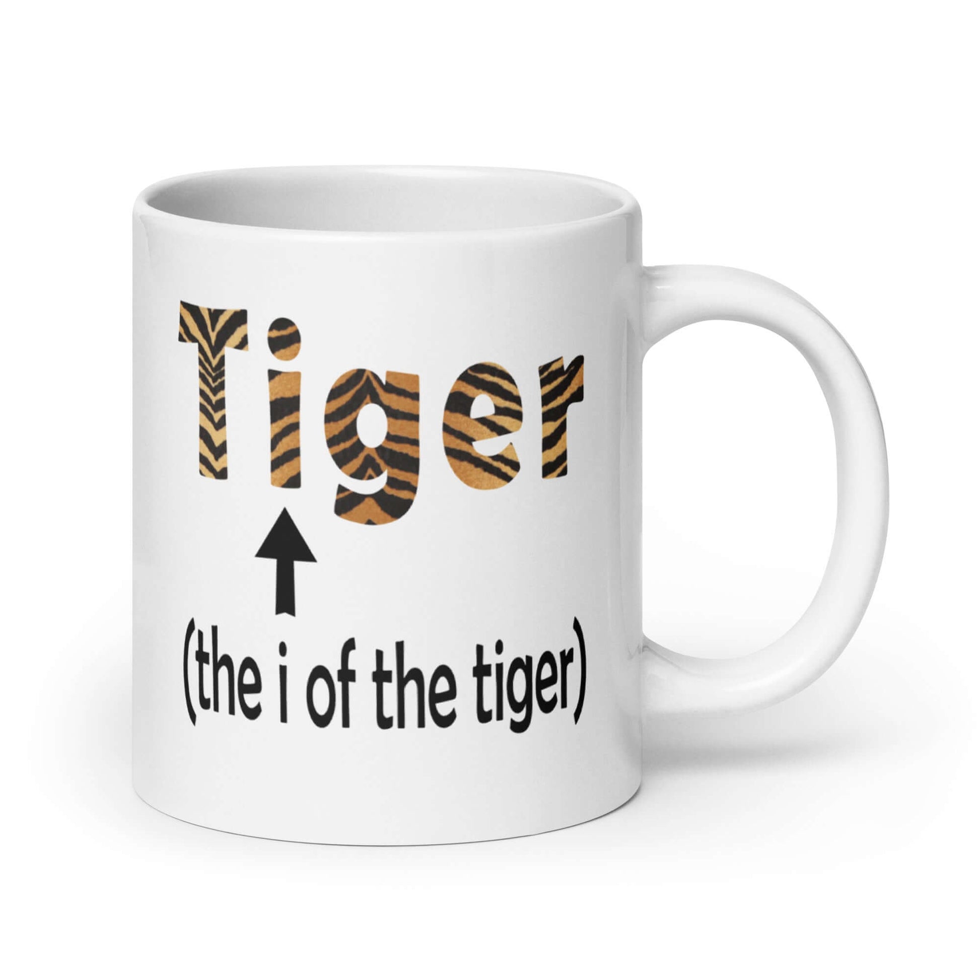 White ceramic coffee mug with the word Tiger printed in a tiger stripe font. In smaller letters beneath tiger it says the I of the tiger with an arrow pointing to the letting I in the words tiger. The graphics are printed on both sides of the mug.