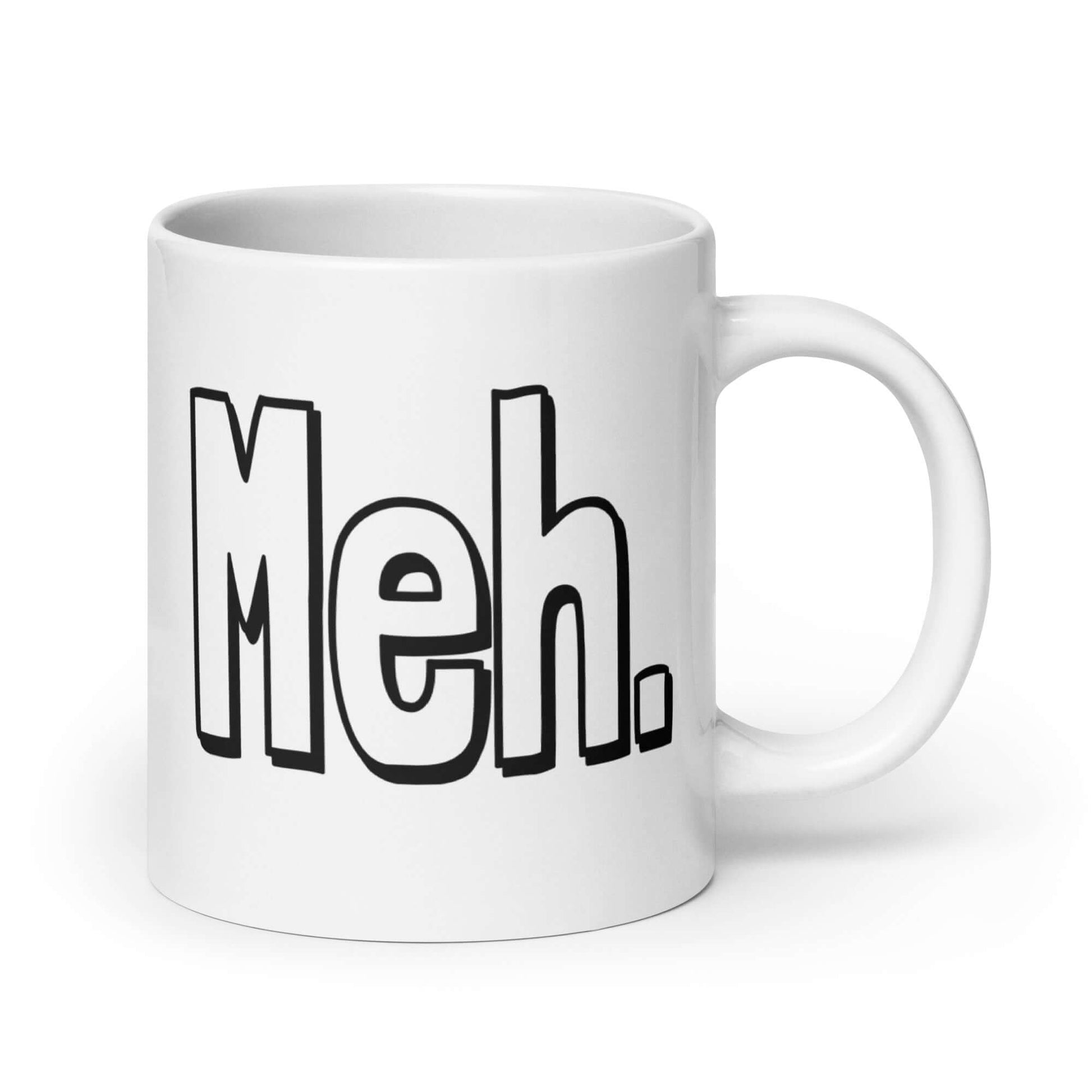 White ceramic coffee mug with the word Meh printed on both sides.