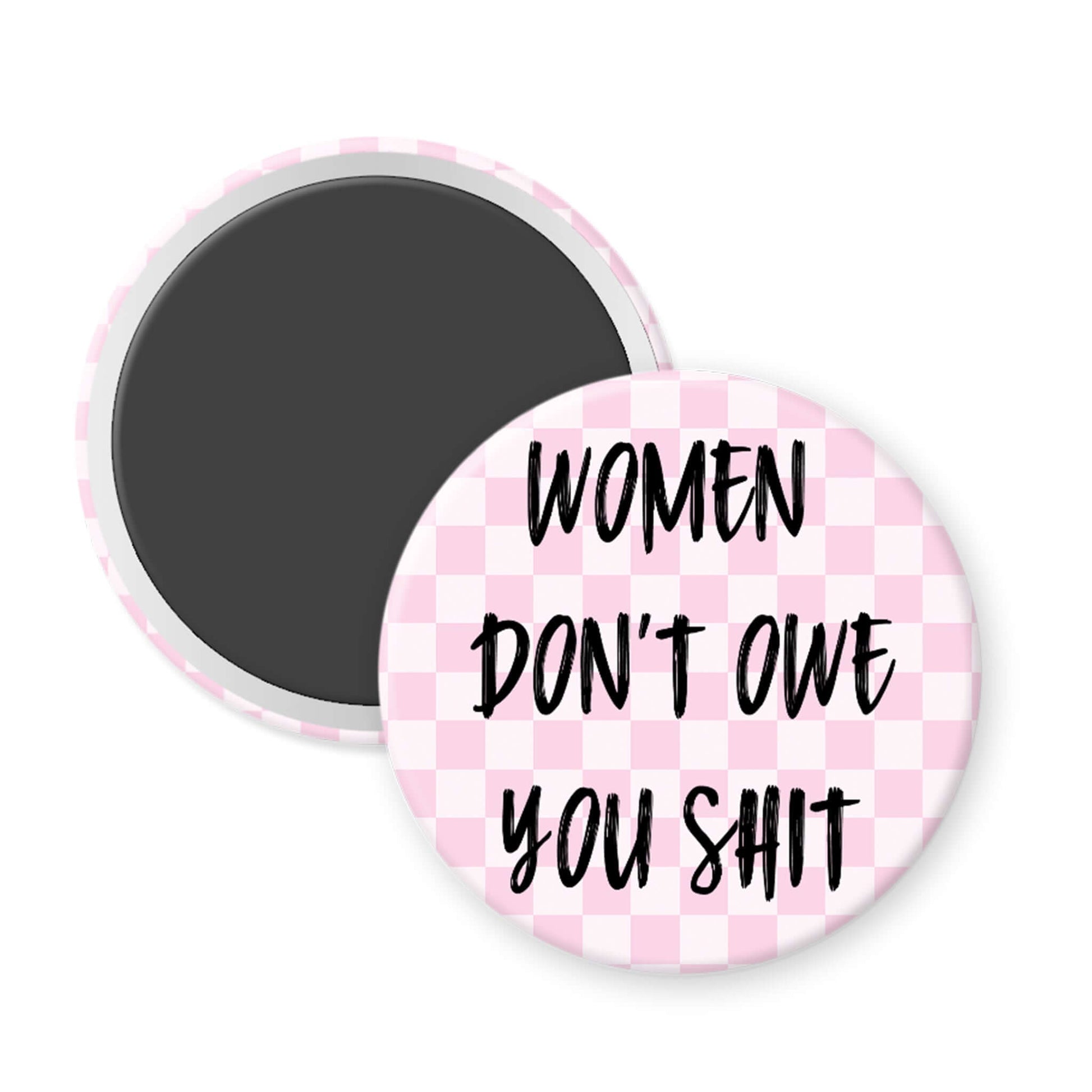 Round magnet with 'Women Don't Owe You Shit' text on a pink checkered background