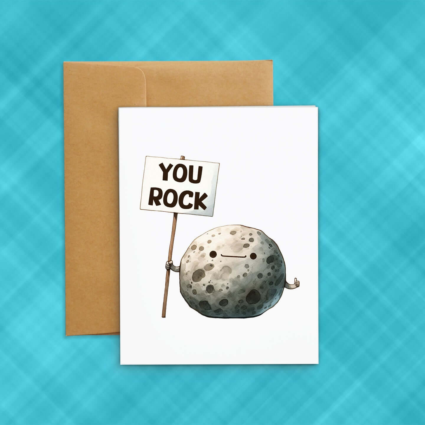 Greeting card with image of a rock holding a sign that says You Rock.