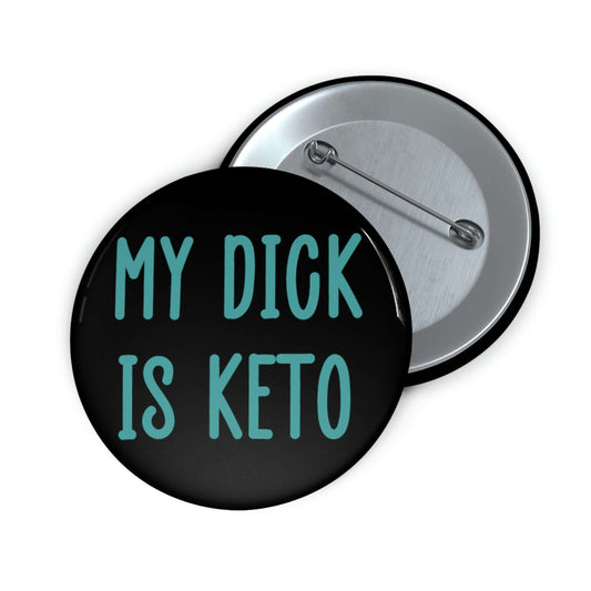 Black pin-back button with the words My dick is keto printed in turquoise font.