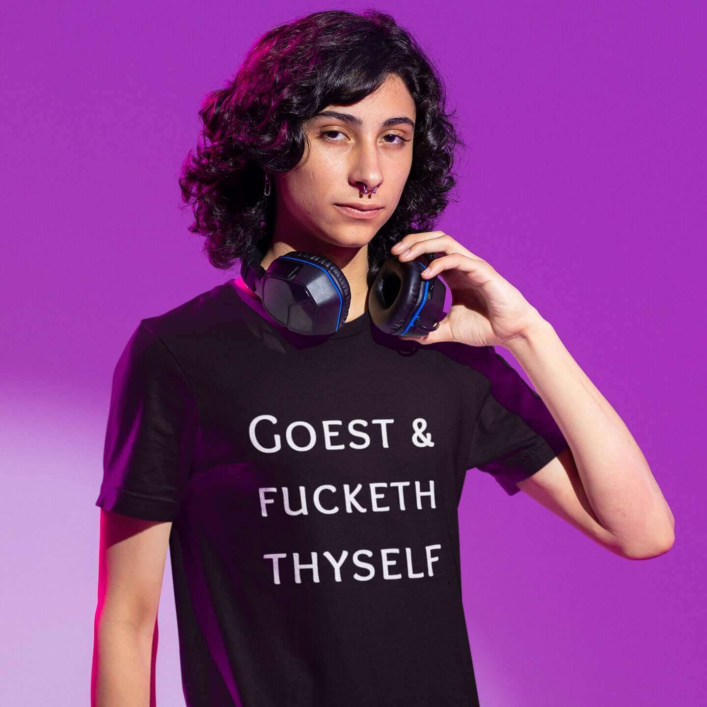 Man wearing black t-shirt with the words Goest and fucketh thyself printed on the front.