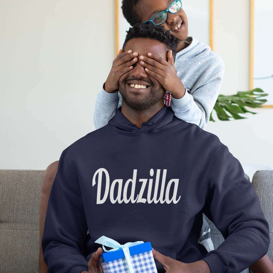 father wearing hooded sweatshirt that says Dadzilla