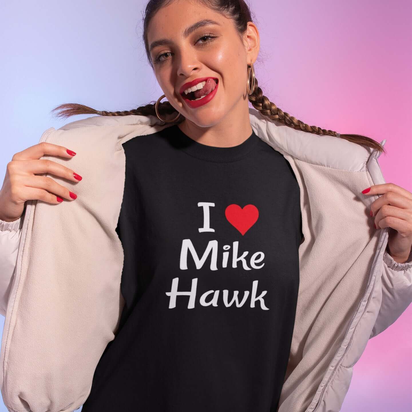 Woman wearing a black t-shirt with the pun I heart Mike Hawk printed on the front.