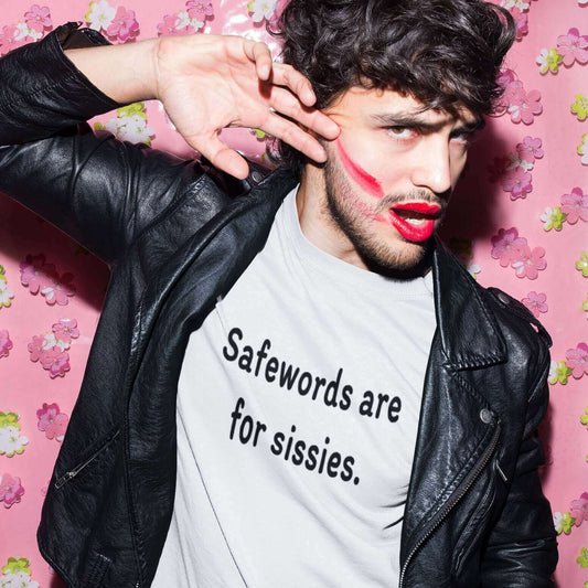 Man wearing a white t-shirt with the phrase Safewords are for sissies printed on the front.