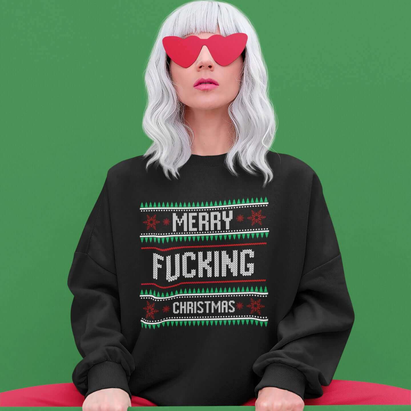 woman wearing merry fucking christmas sweatshirt