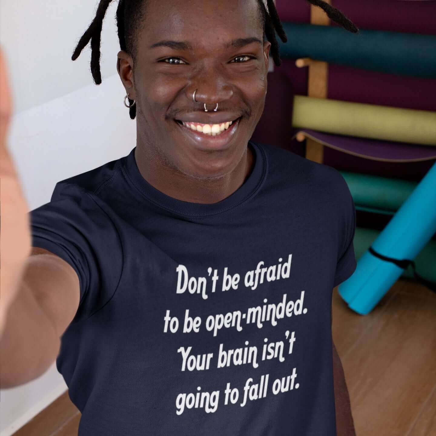 man wearing dont be afraid to be open minded your brain isnt going to fall out tshirt