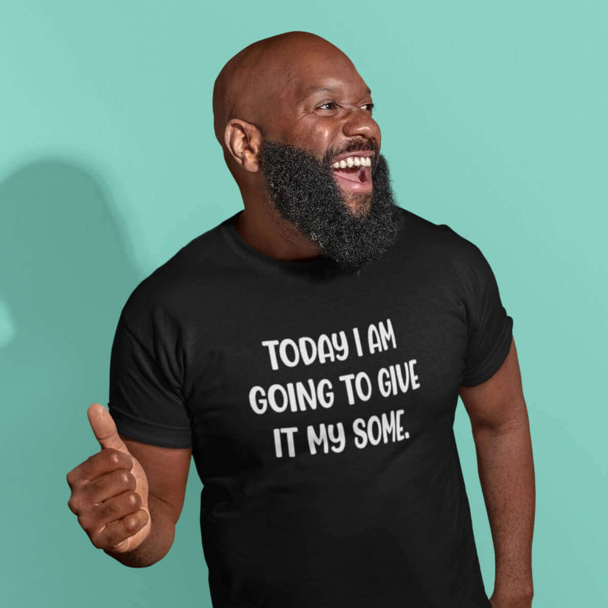 Laughing bearded man wearing a black t-shirt with the funny phrase Today I'm going to give it my some printed on the front.