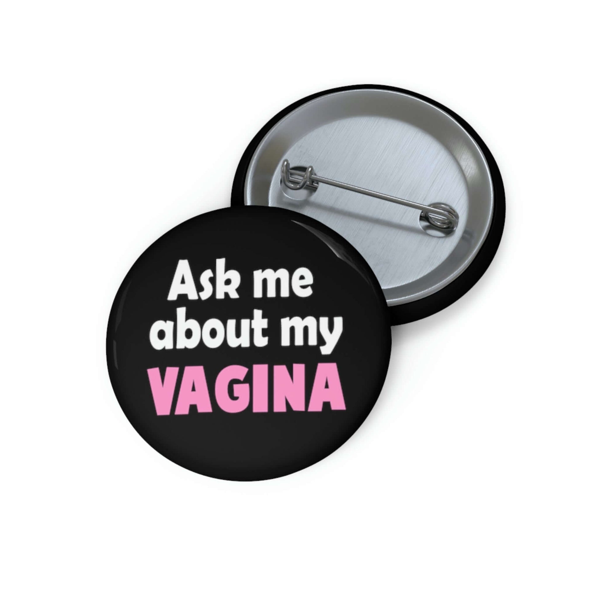 Black pinback button that says Ask me about my vagina. The word vagina is printed in pink. The rest of the text is white.