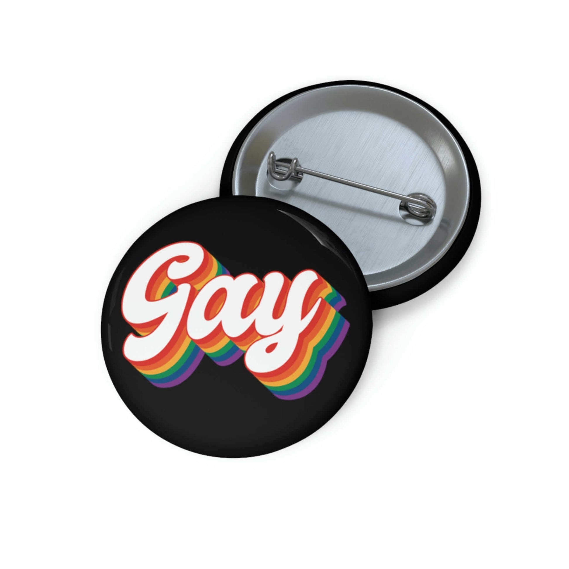 Black pinback button with the word gay in rainbow font.