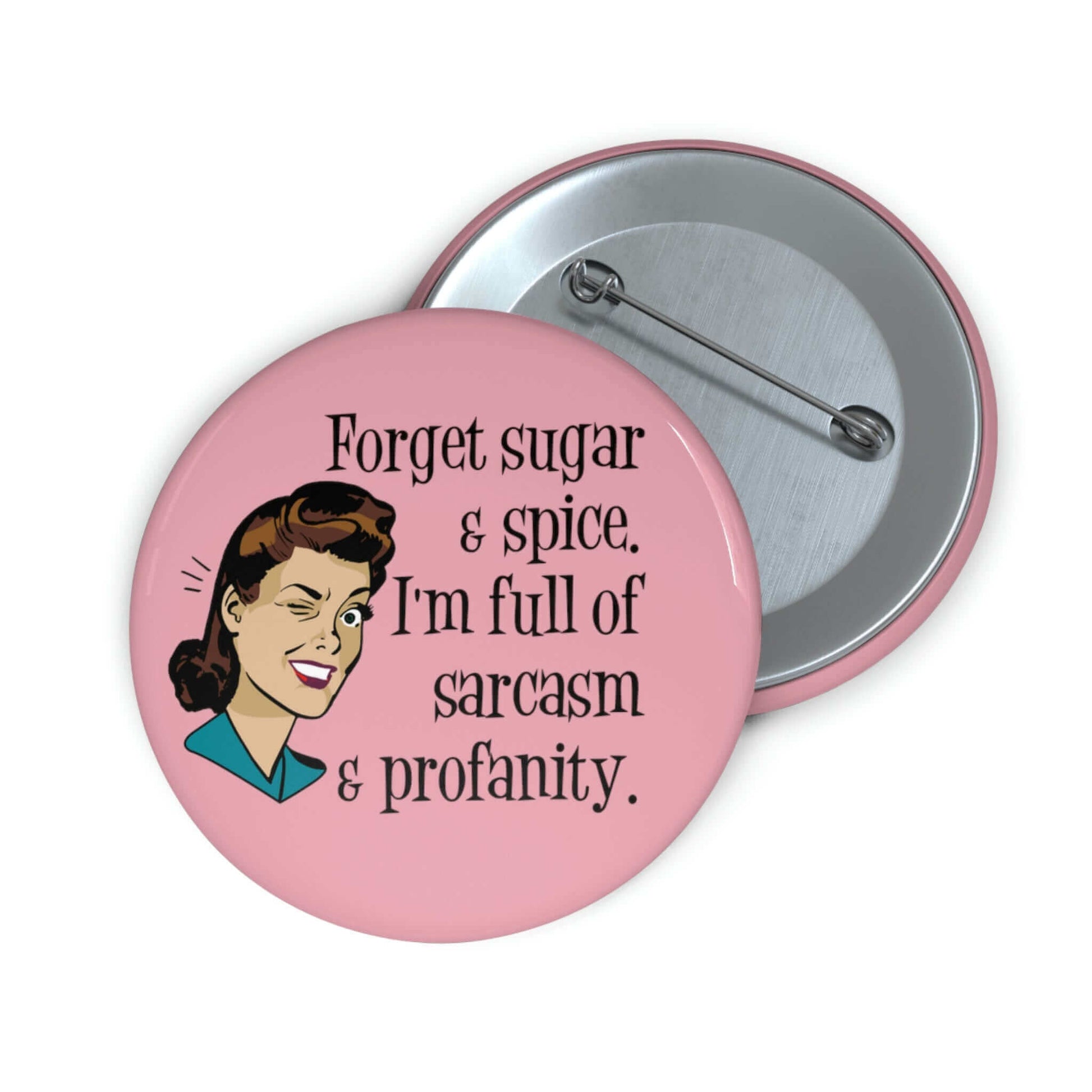 Pink pin-back button with image of winking retro woman and the words Forget sugar and spice, I'm full of sarcasm and profanity.