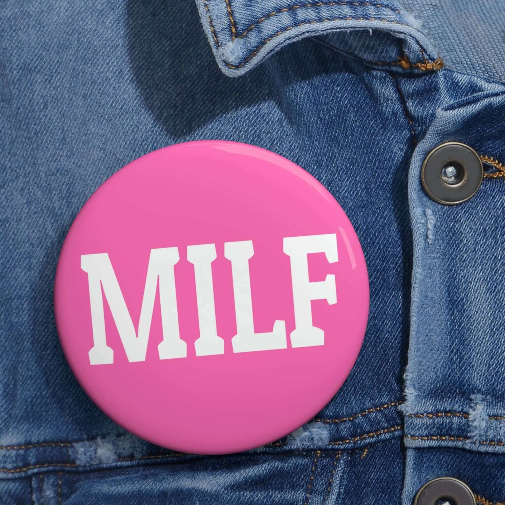 Bright pink pin-back button with the acronym MILF.