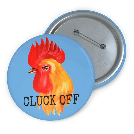 Light blue pun pinback button with image of a chicken and the words Cluck off beneath.