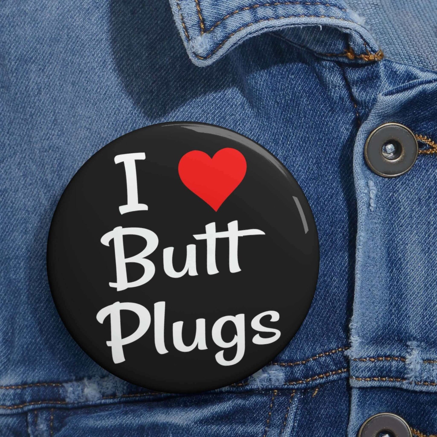 Pinback button that says I heart butt plugs.