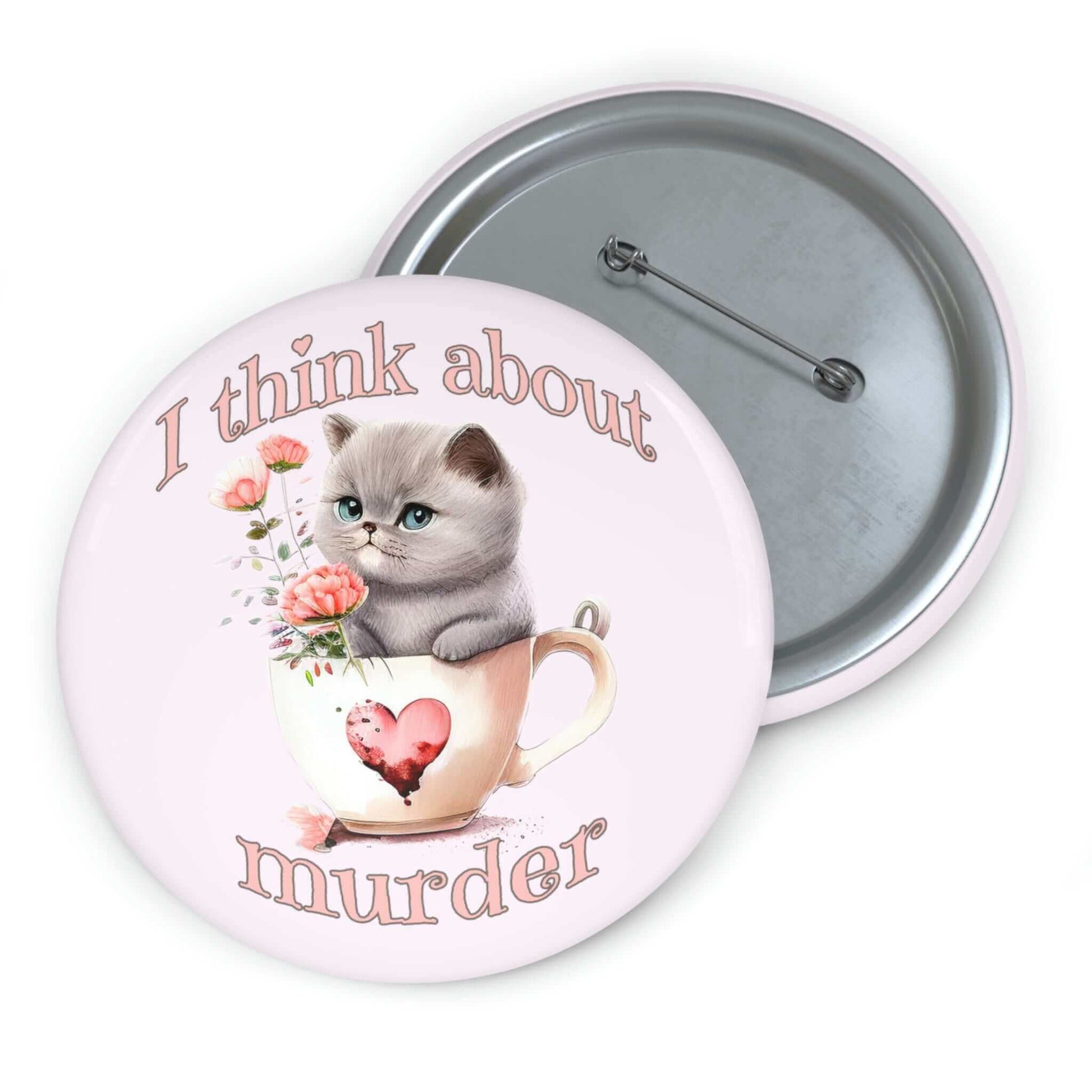 Sarcastic pin-back button that says I think about murder with image of cute fluffy kitten sitting in a teacup.