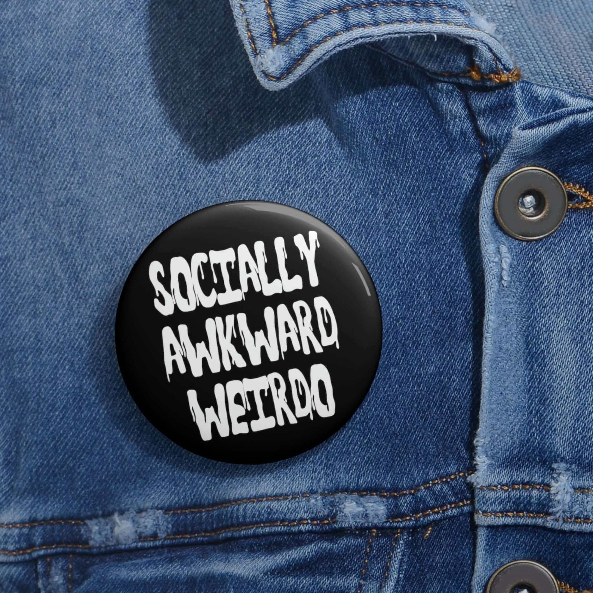 Pinback button that says socially awkward weirdo.