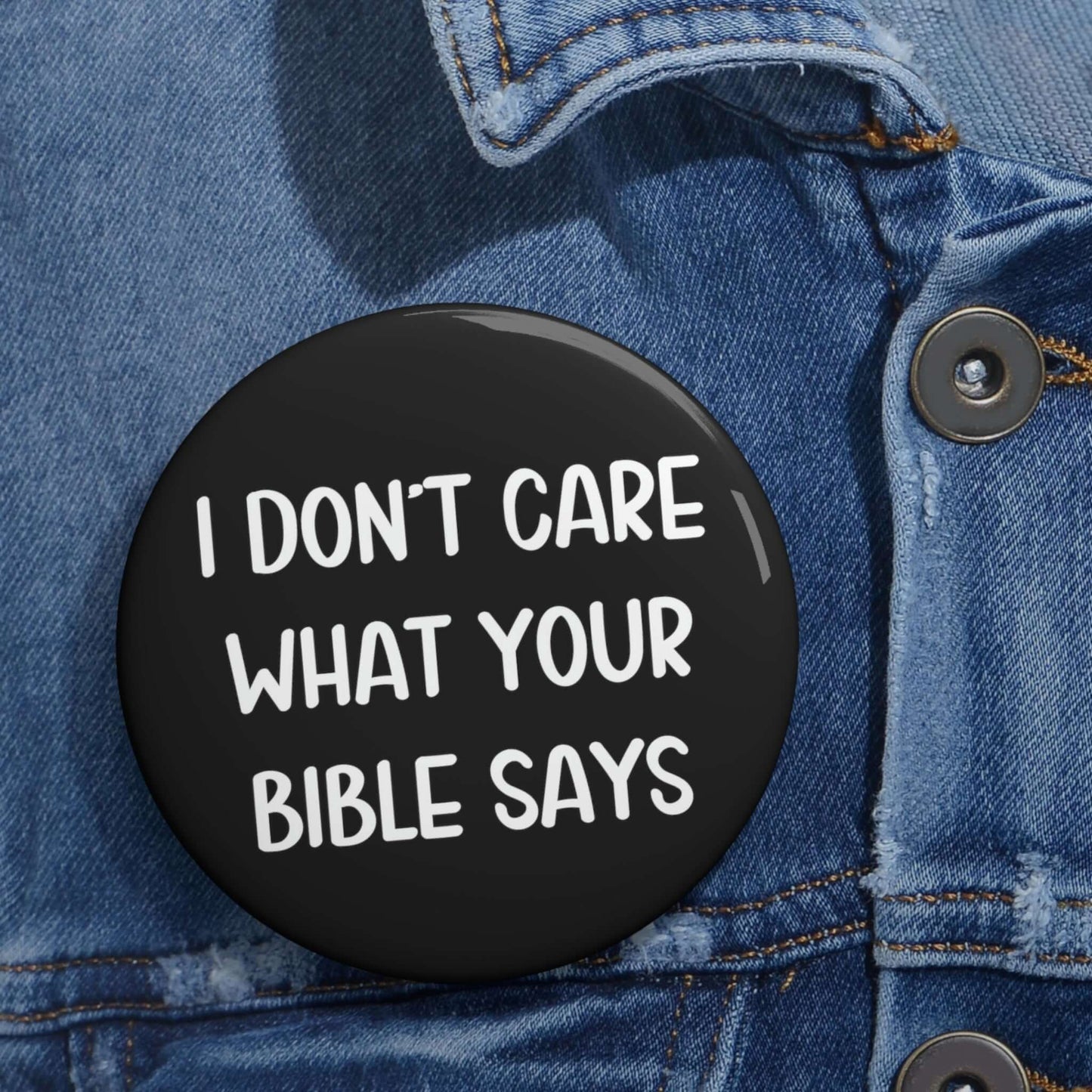 Pinback button that says I don't care what your bible says.