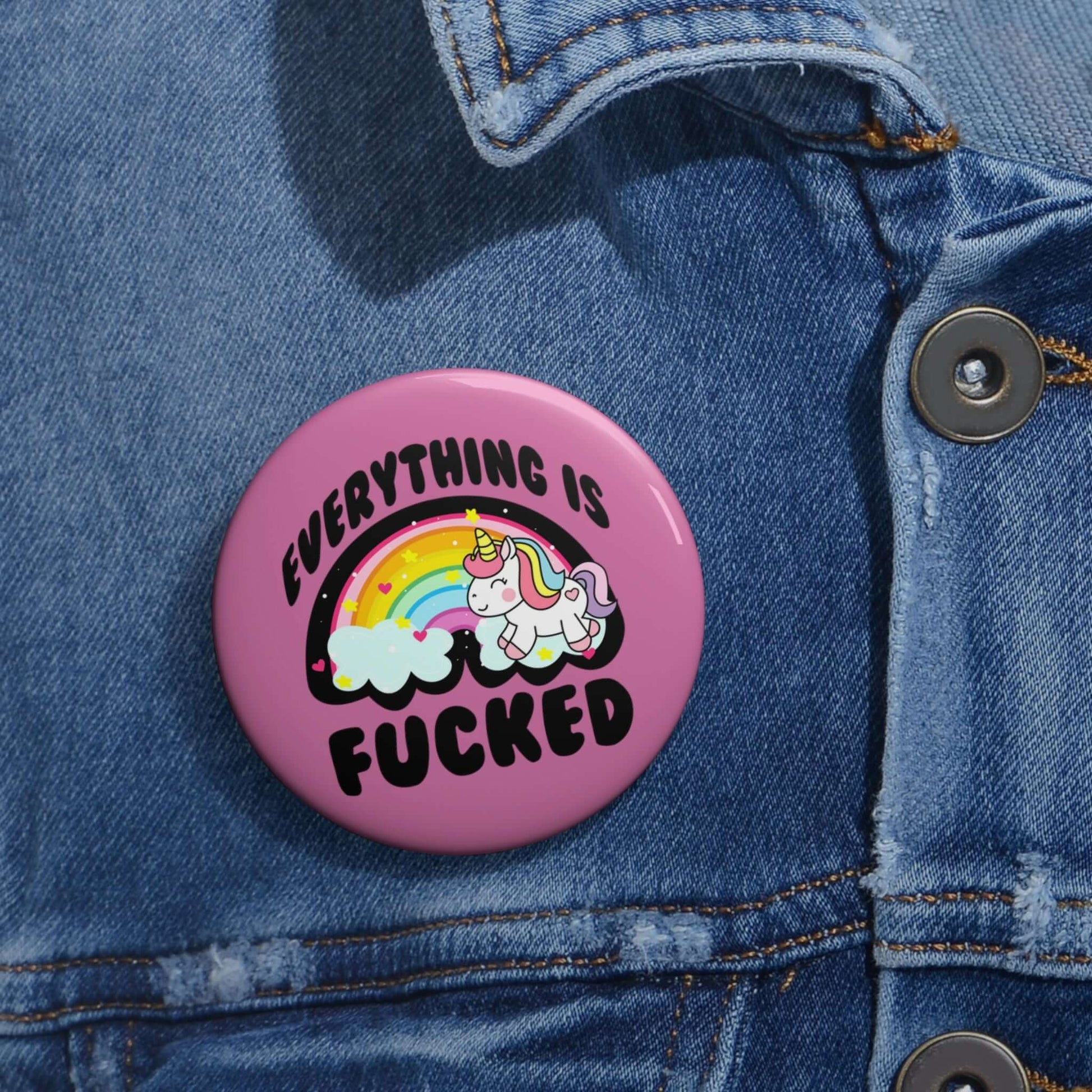 Pink pin-back button with rainbow unicorn image that says Everything is fucked.