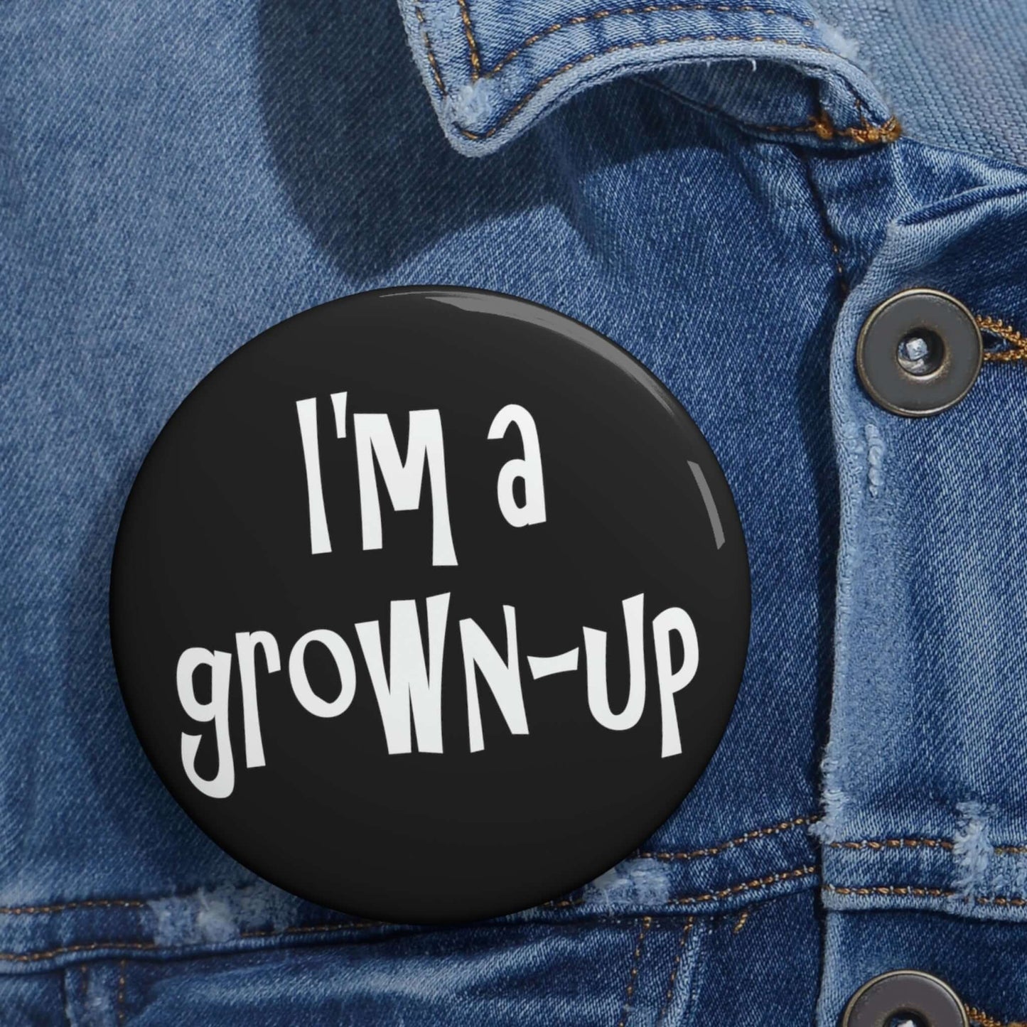 Pin-back button that says I'm a grown-up.