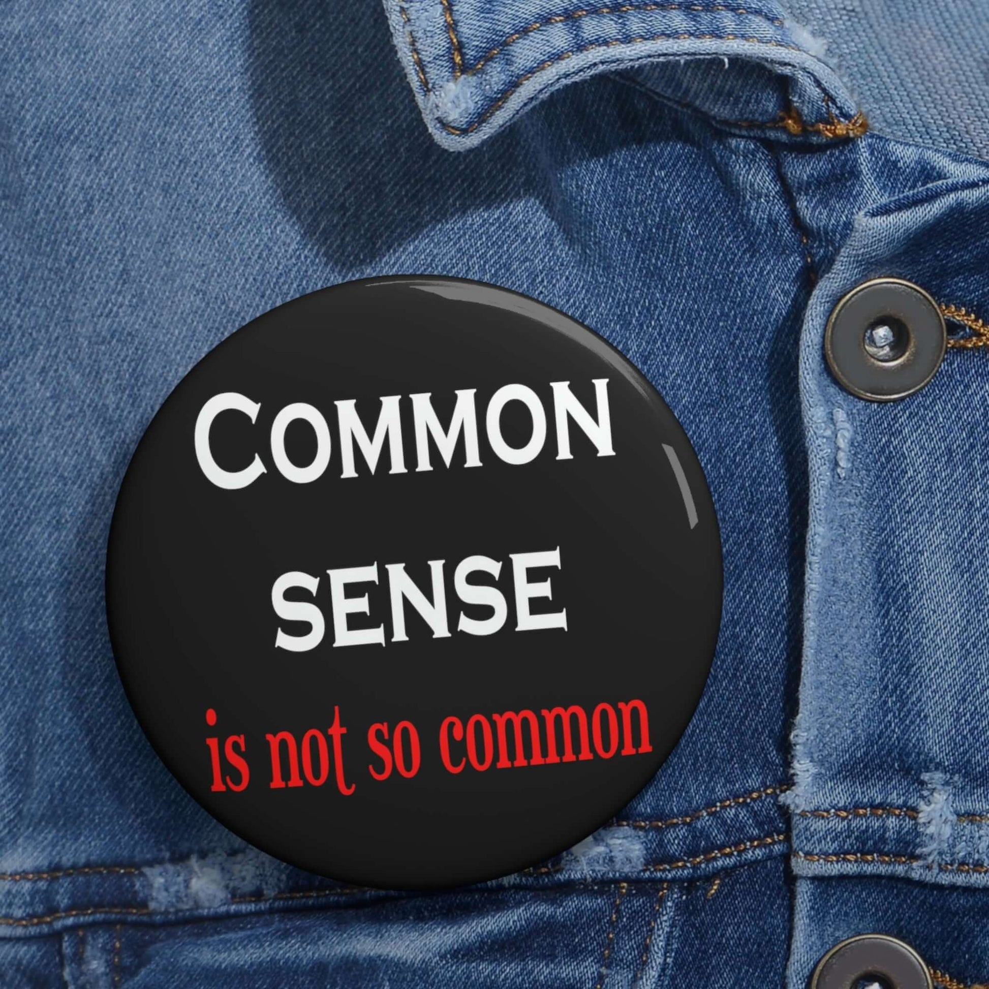 Black pin-back button that says common sense is not so common.