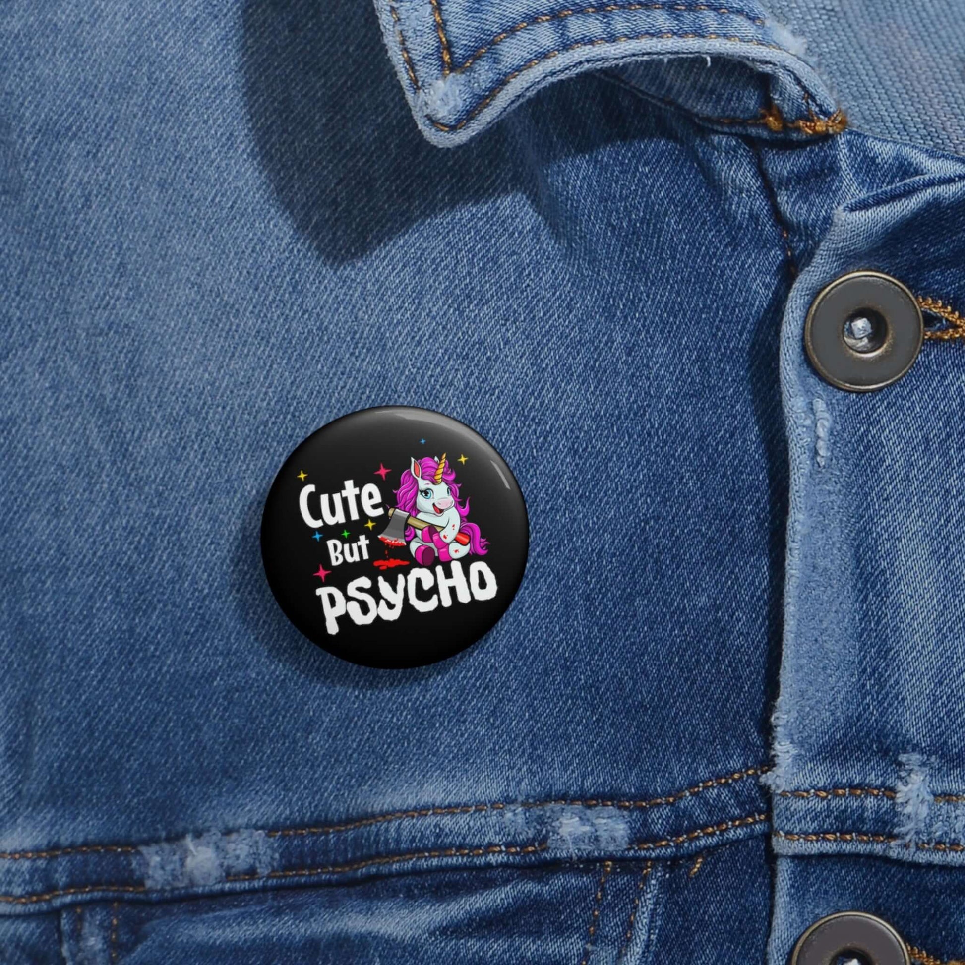 Pin-back button that says Cute but psycho with image of a cute unicorn holding a knife.