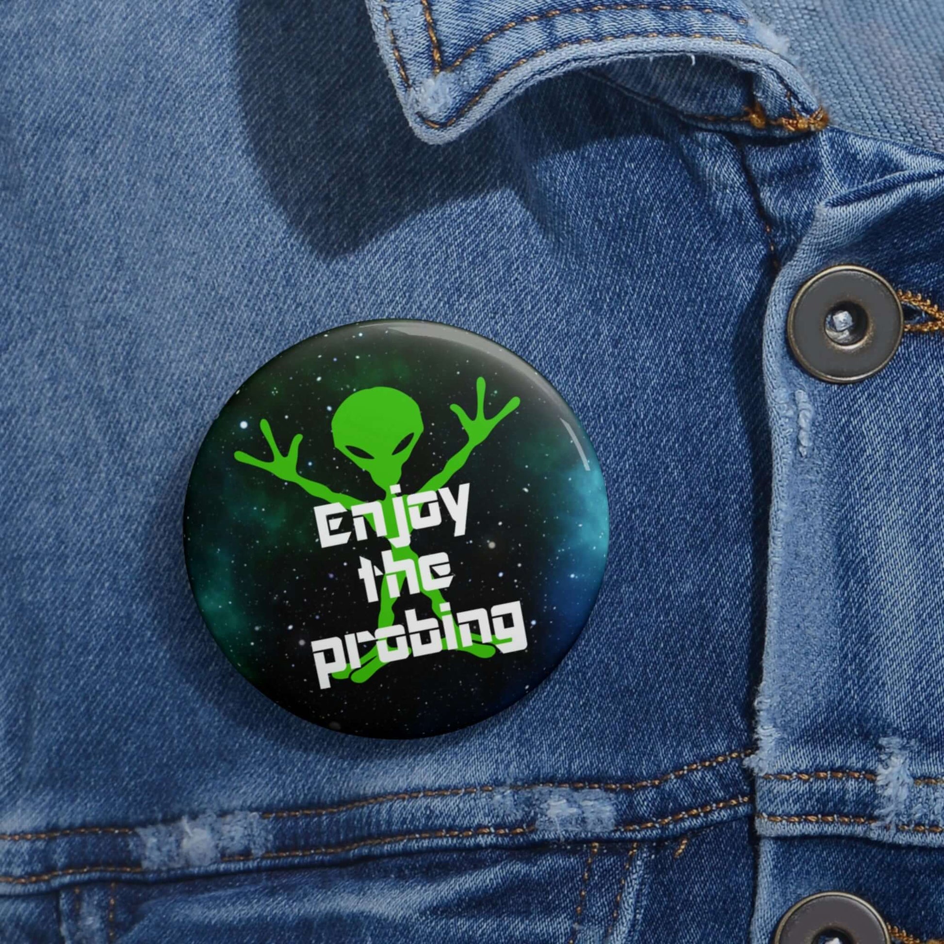 Funny pin-back button with image of an alien and the words Enjoy the probing.