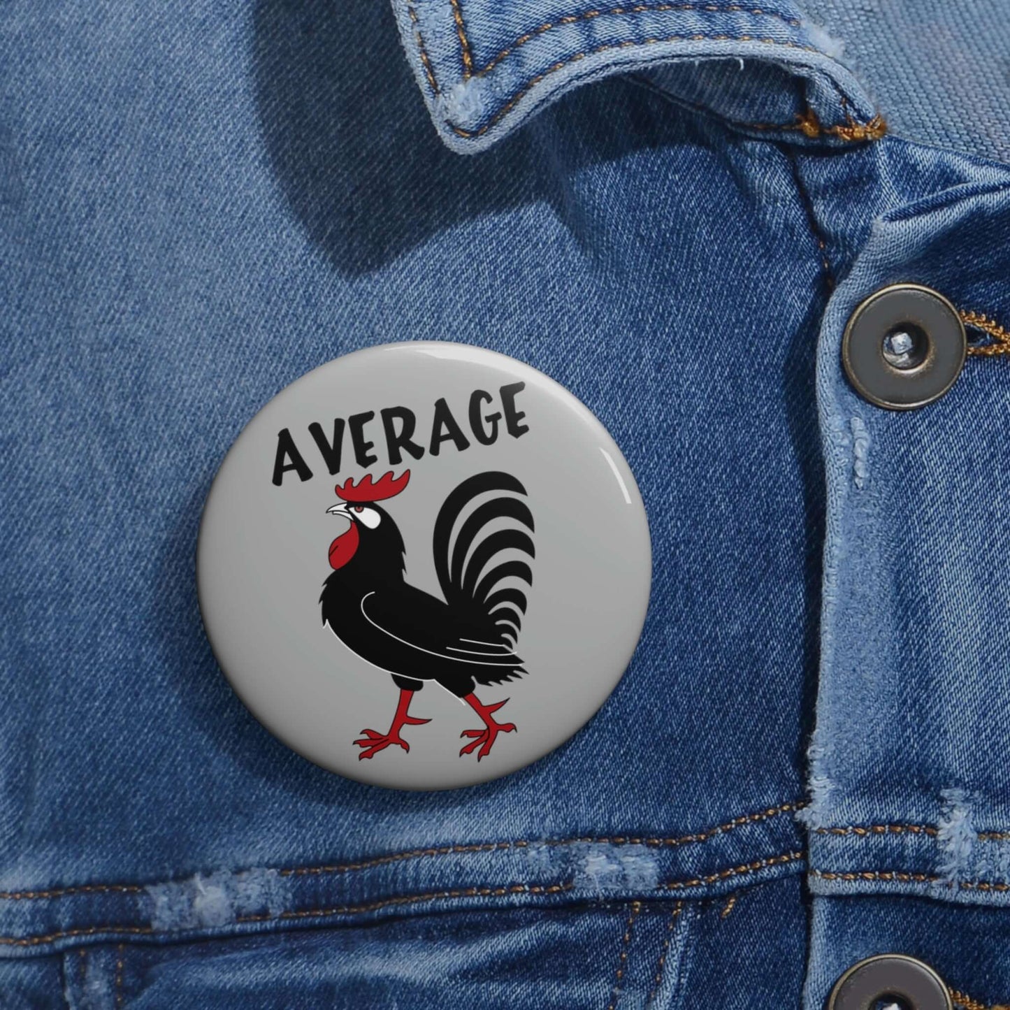 Pinback button with image of a rooster with the word average printed above.