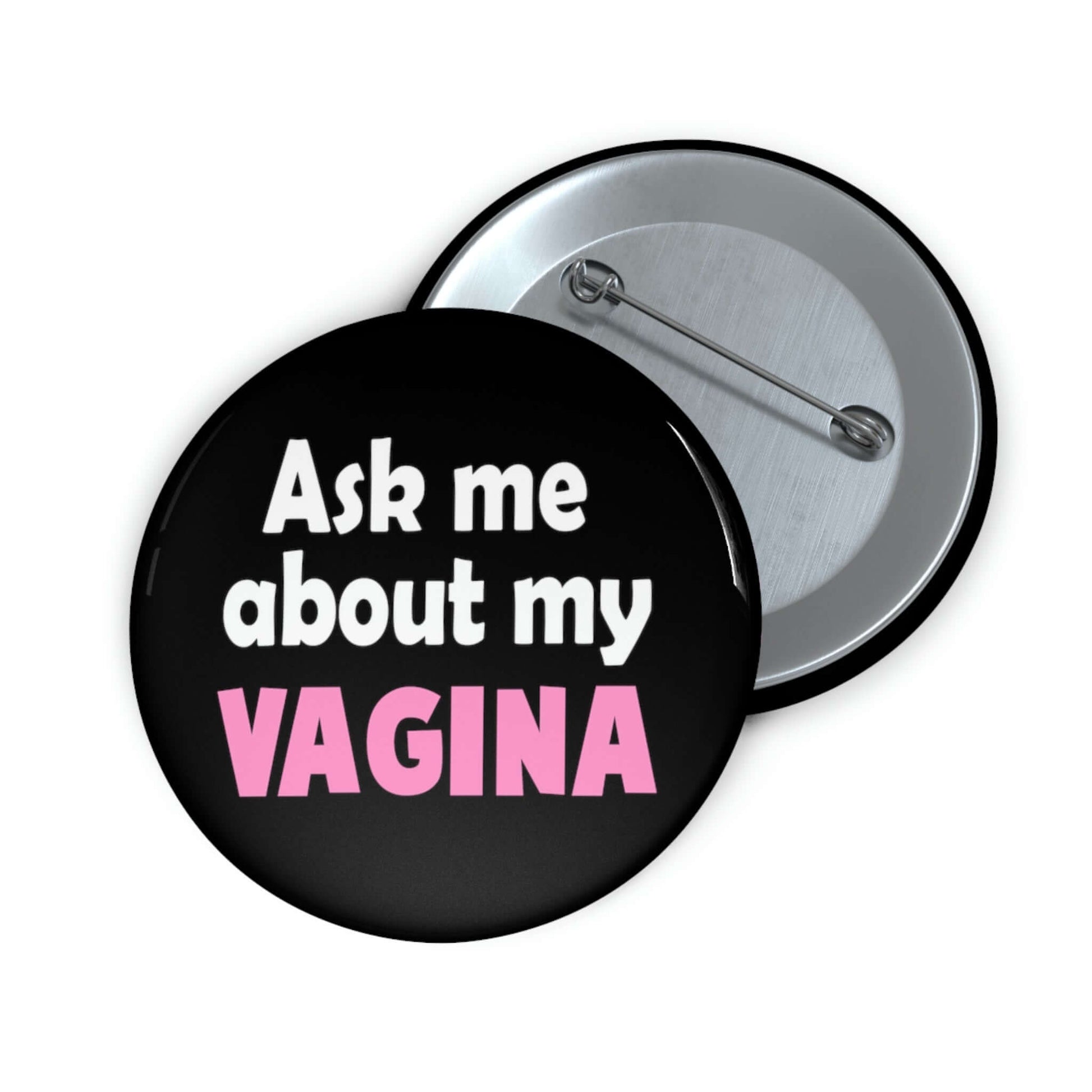 Black pinback button that says Ask me about my vagina. The word vagina is printed in pink. The rest of the text is white.