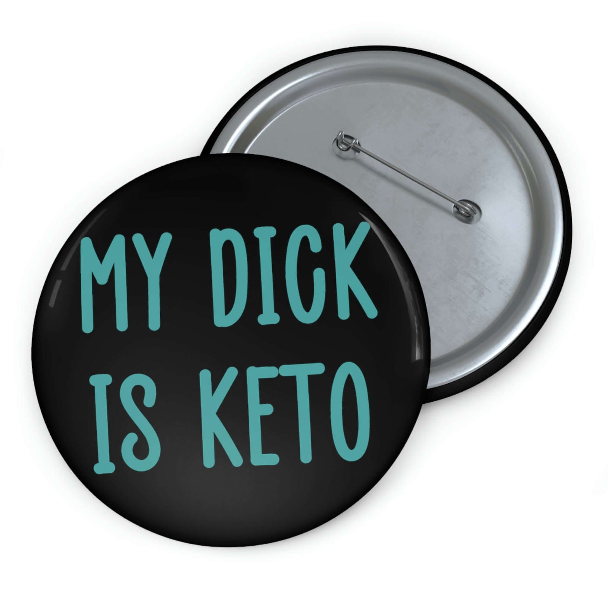 Black pin-back button with the words My dick is keto printed in turquoise font.