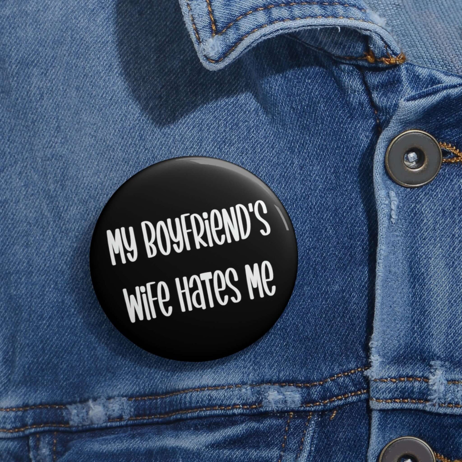 Pin-back button that says my boyfriends wife hates me.