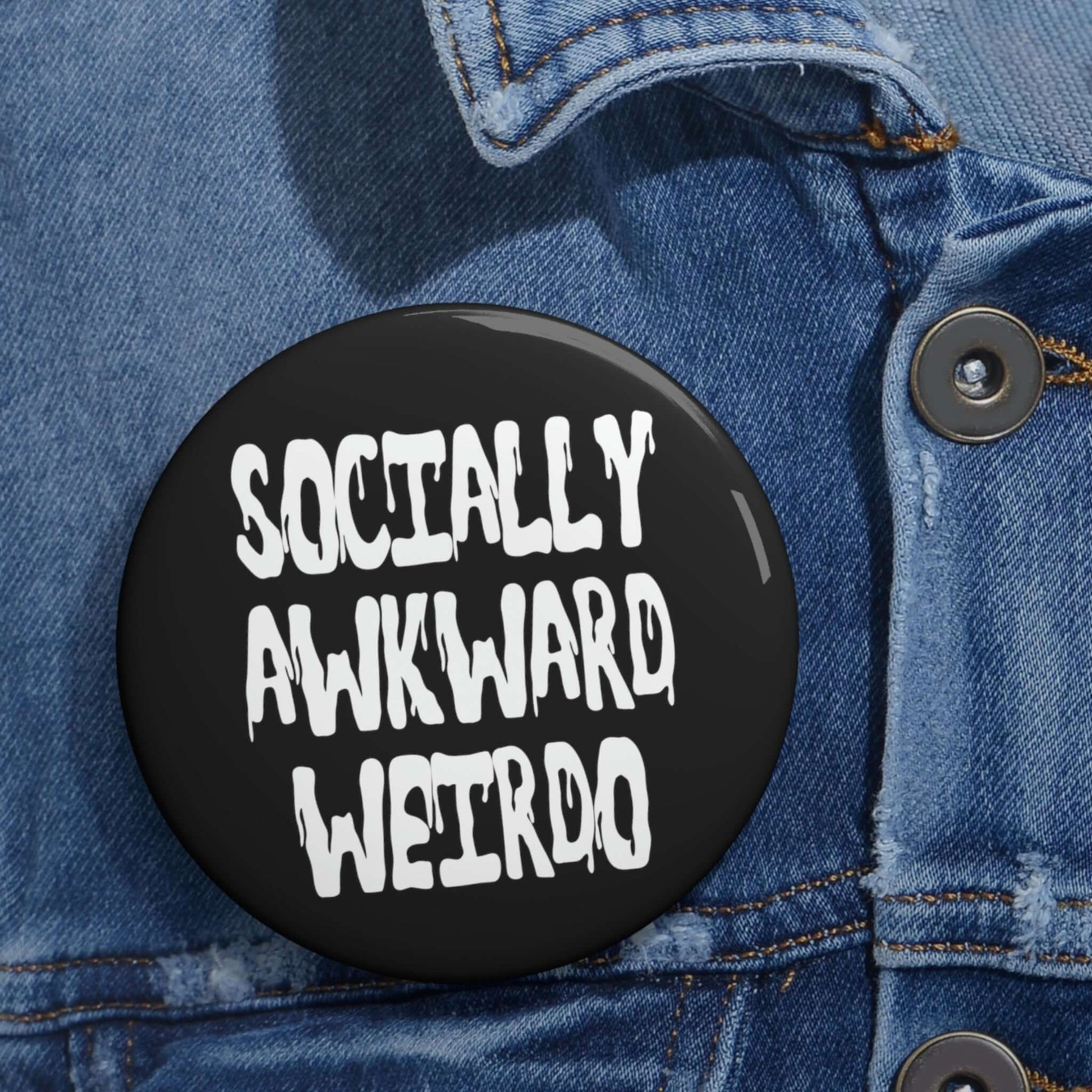 Pinback button that says socially awkward weirdo.